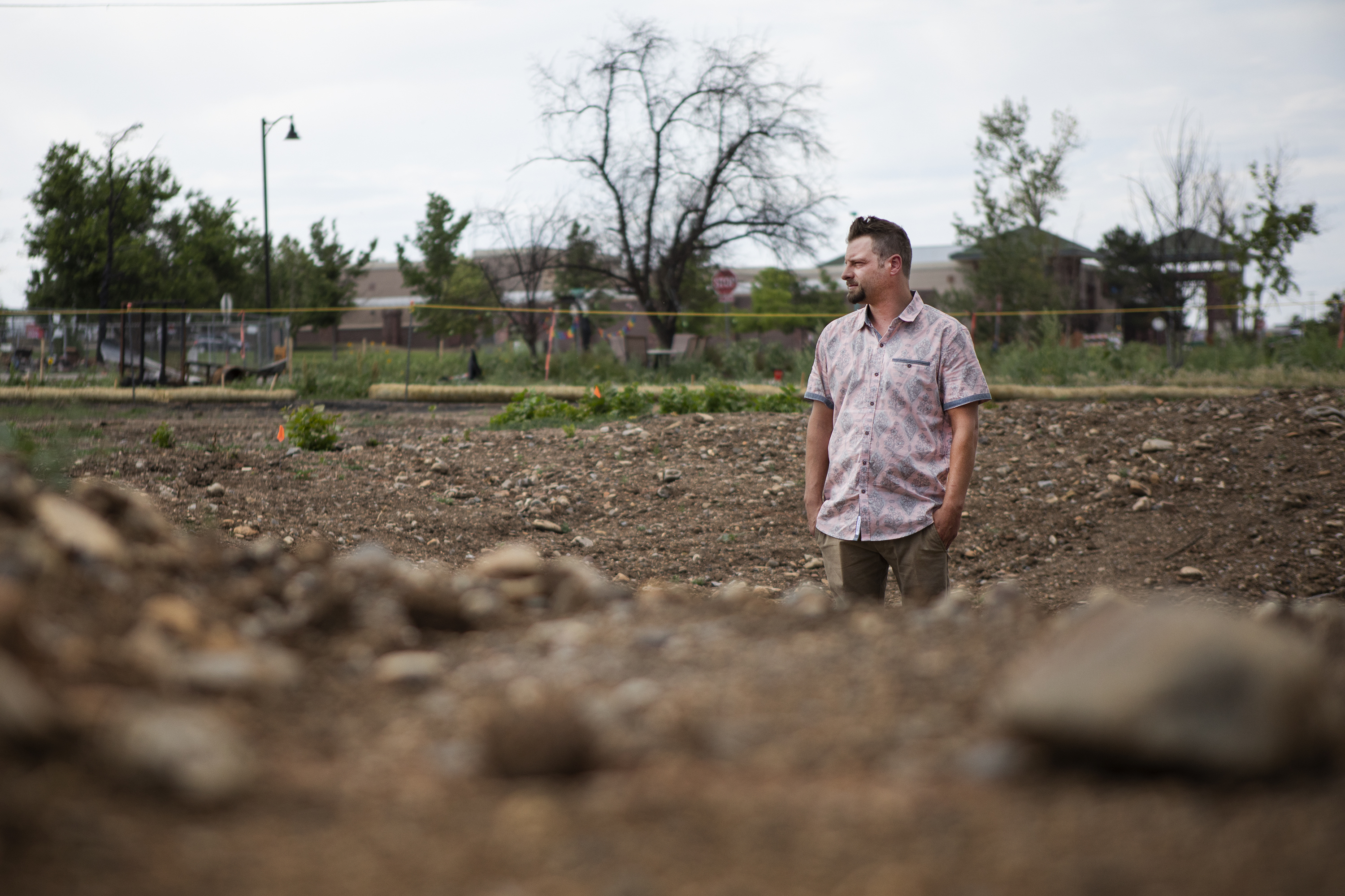 Superior resident Adam Ciesielski poses for a portrait in the gravel pit where his approximately 3000 square foot home once stood before being destroyed in the Marshall Fire, as seen on Thursday, June 23, 2022, in Superior, Colo. Ciesielski planned to have the foundation reinforced and used to rebuild his home, but it was removed without authorization while crews worked the area. (Timothy Hurst/The Denver Gazette) (Timothy Hurst)
