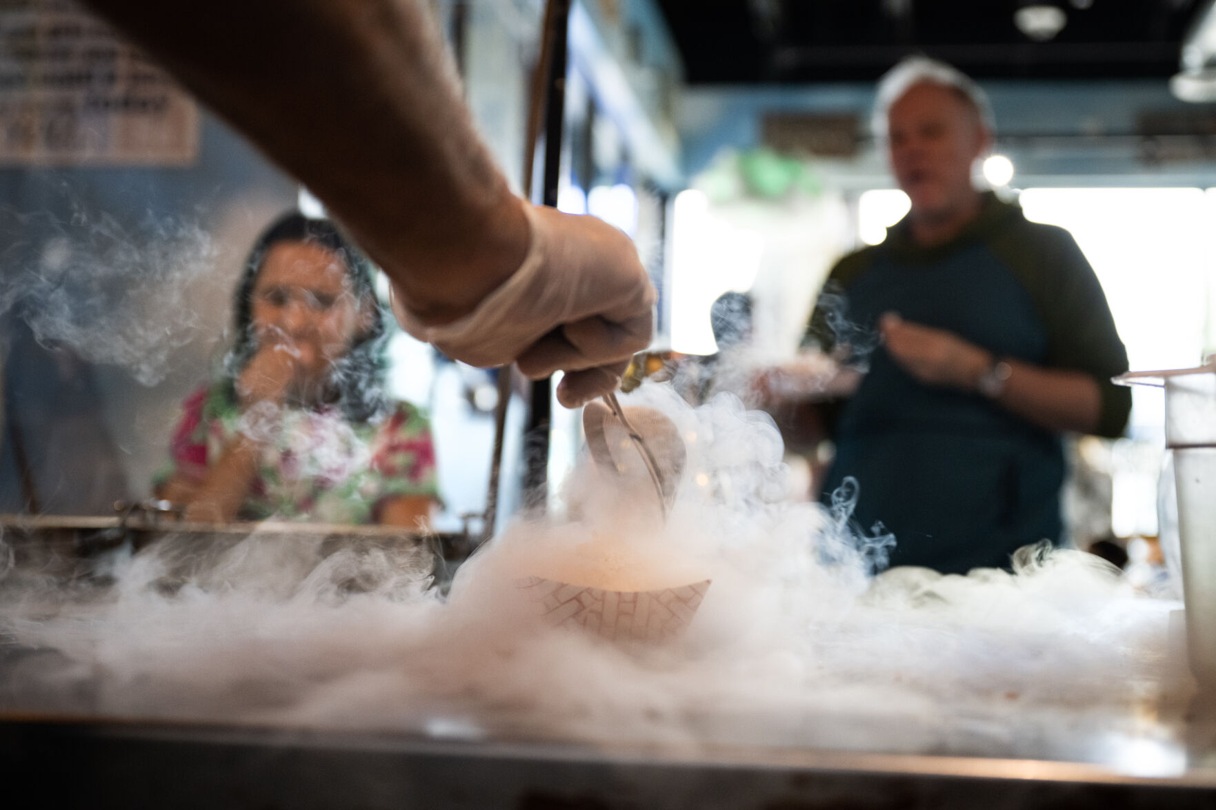 Ian Kleinman pours liquid nitrogen over a guest’s ice cream sundae at The Inventing Room in Denver. (TimHursttim.hurst@gazette.comhttps://secure.gravatar.com/avatar/aca82bd62b4ee425c598527cd6faa1b1?d=mm&r=g)