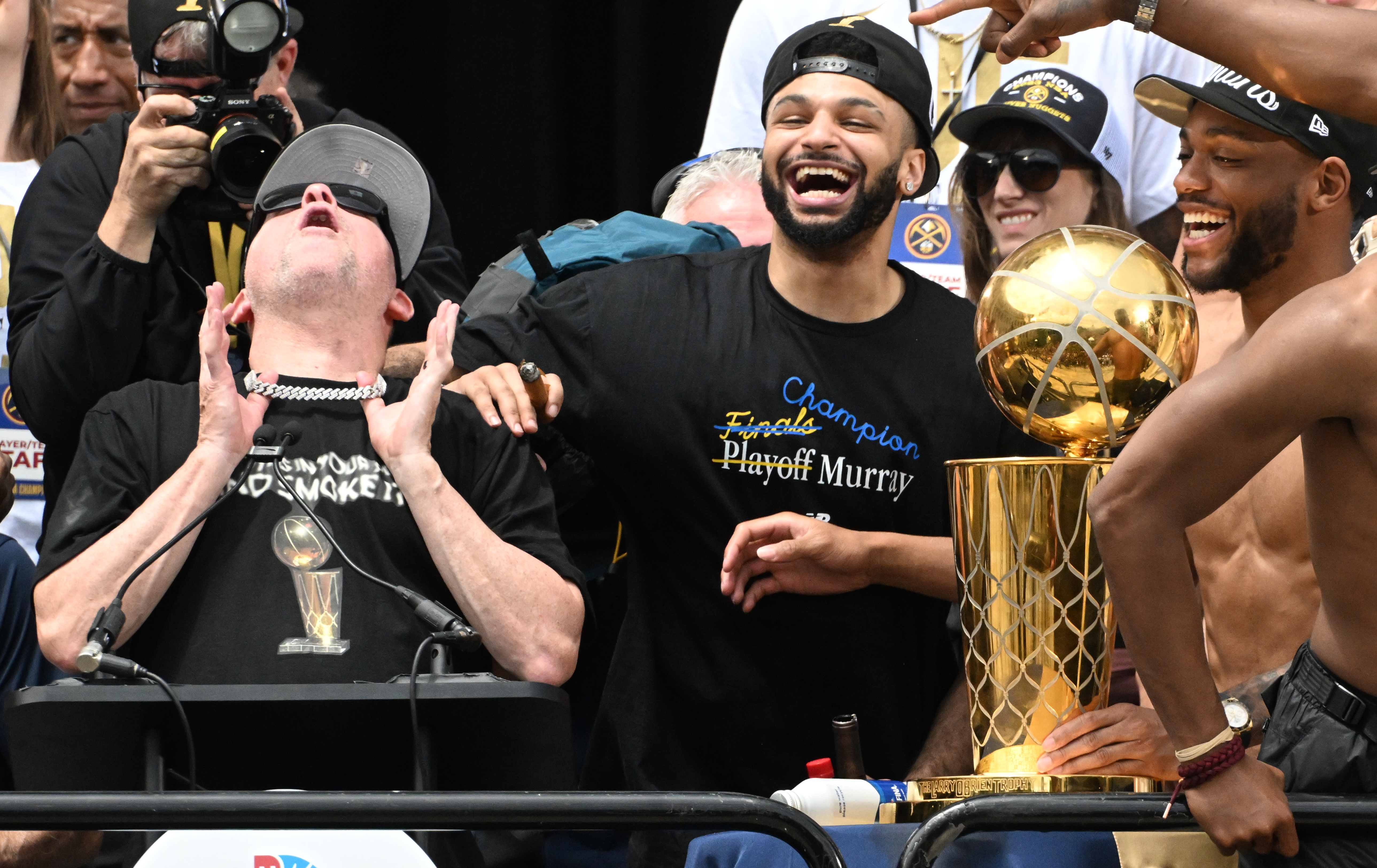 Nuggets Jamal Murray gets a kick out of Head Coach Michael Malones antics at the Nuggets NBA championship celebration at the Denver City and County Building of Denver on Thursday, June 15, 2023. (Photo by Jerilee Bennett, The Denver Gazette) (Jerilee Bennett, The Denver Gazette)