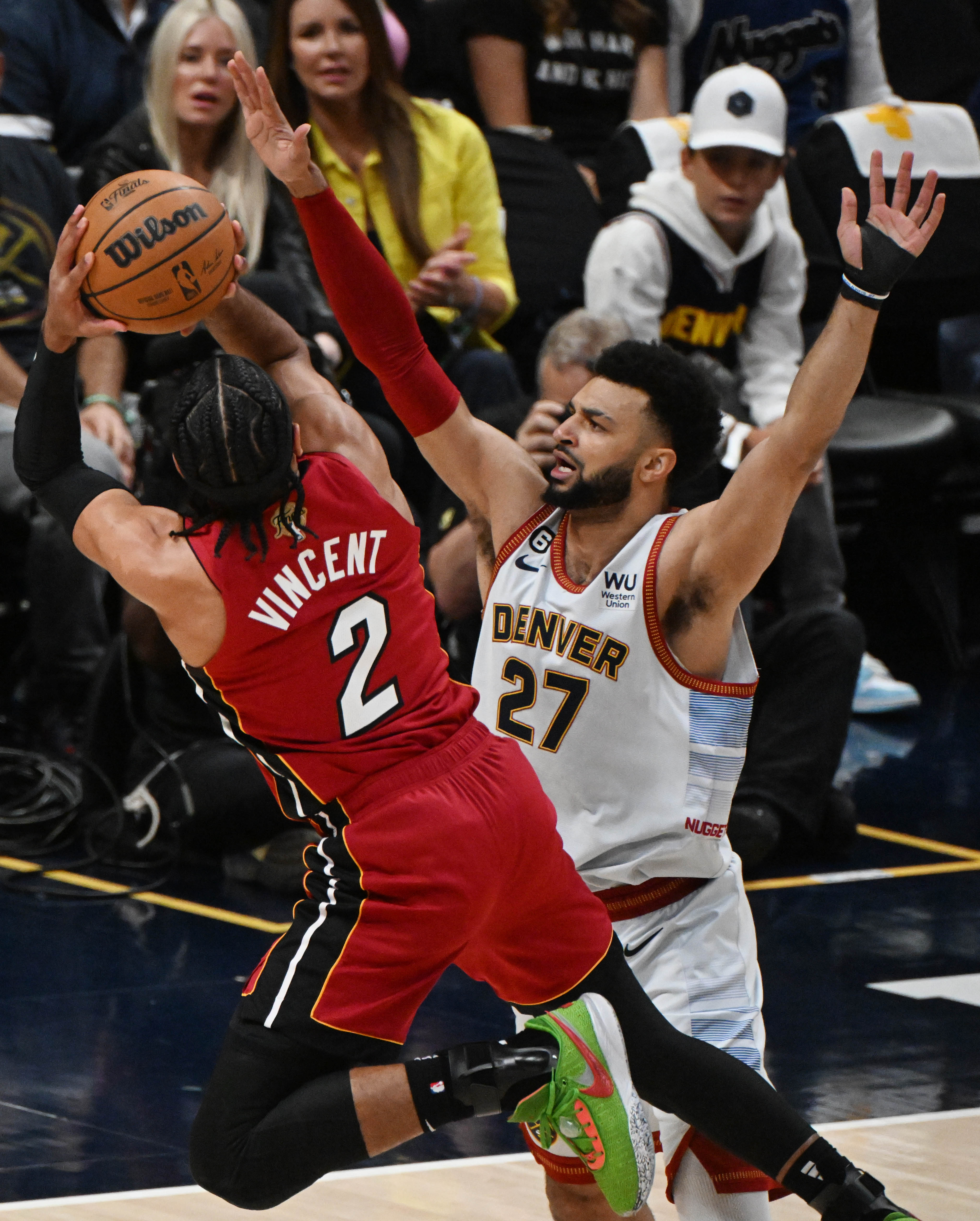 Denver Nuggets guard Jamal Murray (27) defends Miami Heat guard Gabe Vincent (2) during the first quarter of game 5 of the NBA Finals at Ball Arena on Monday, June 12, 2023. (Photo by Jerilee Bennett, The Gazette)