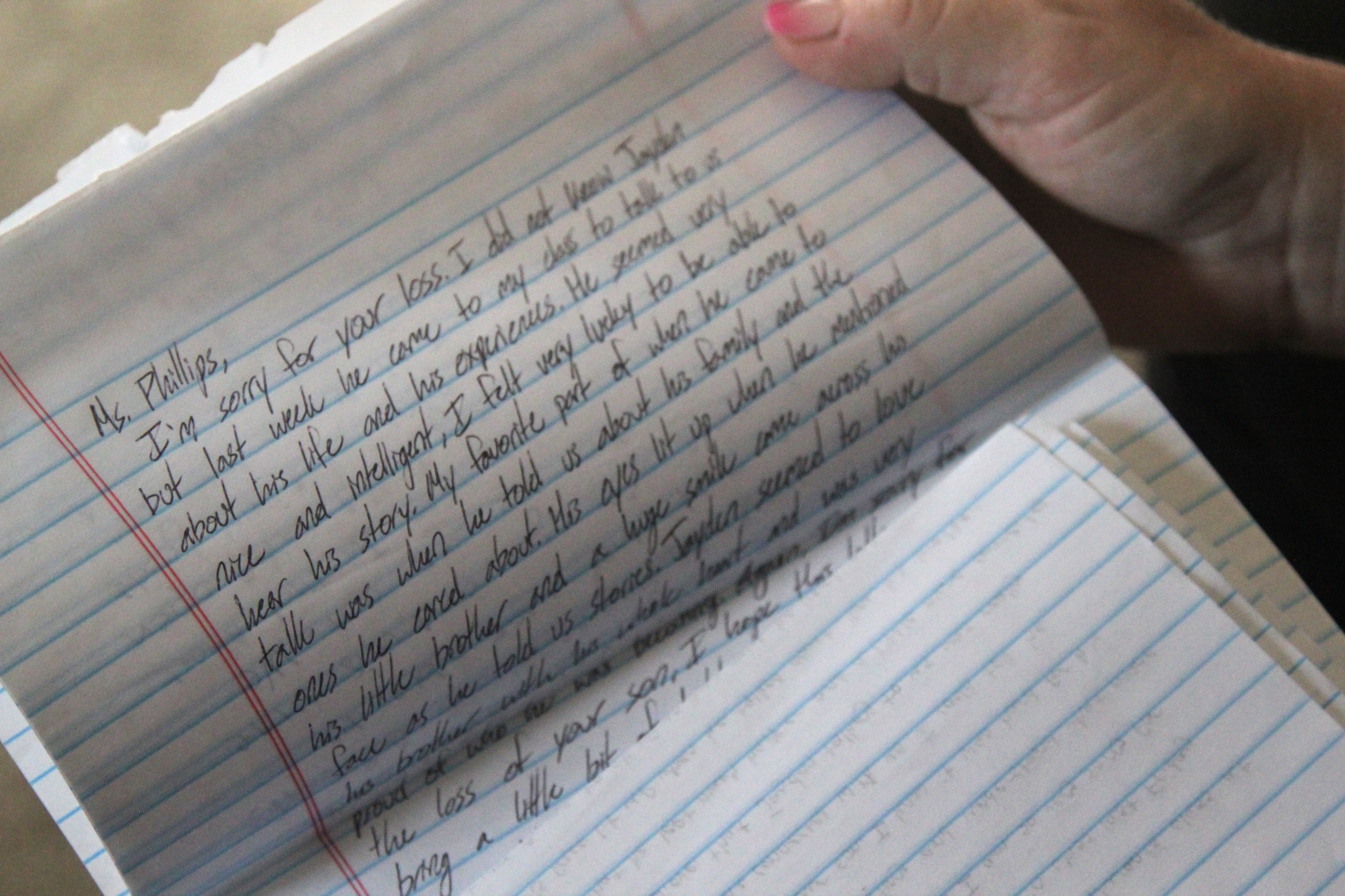 Lisa Phillips is saving letters she received from criminal justice students about the impact her son, Jayden, had on them when he visited their class. Jayden spoke extensively about the love he had for his younger brother, Donnie, during the class visit, students said. Jayden died in a shooting shortly after the class visit. (Jessica Gibbs)