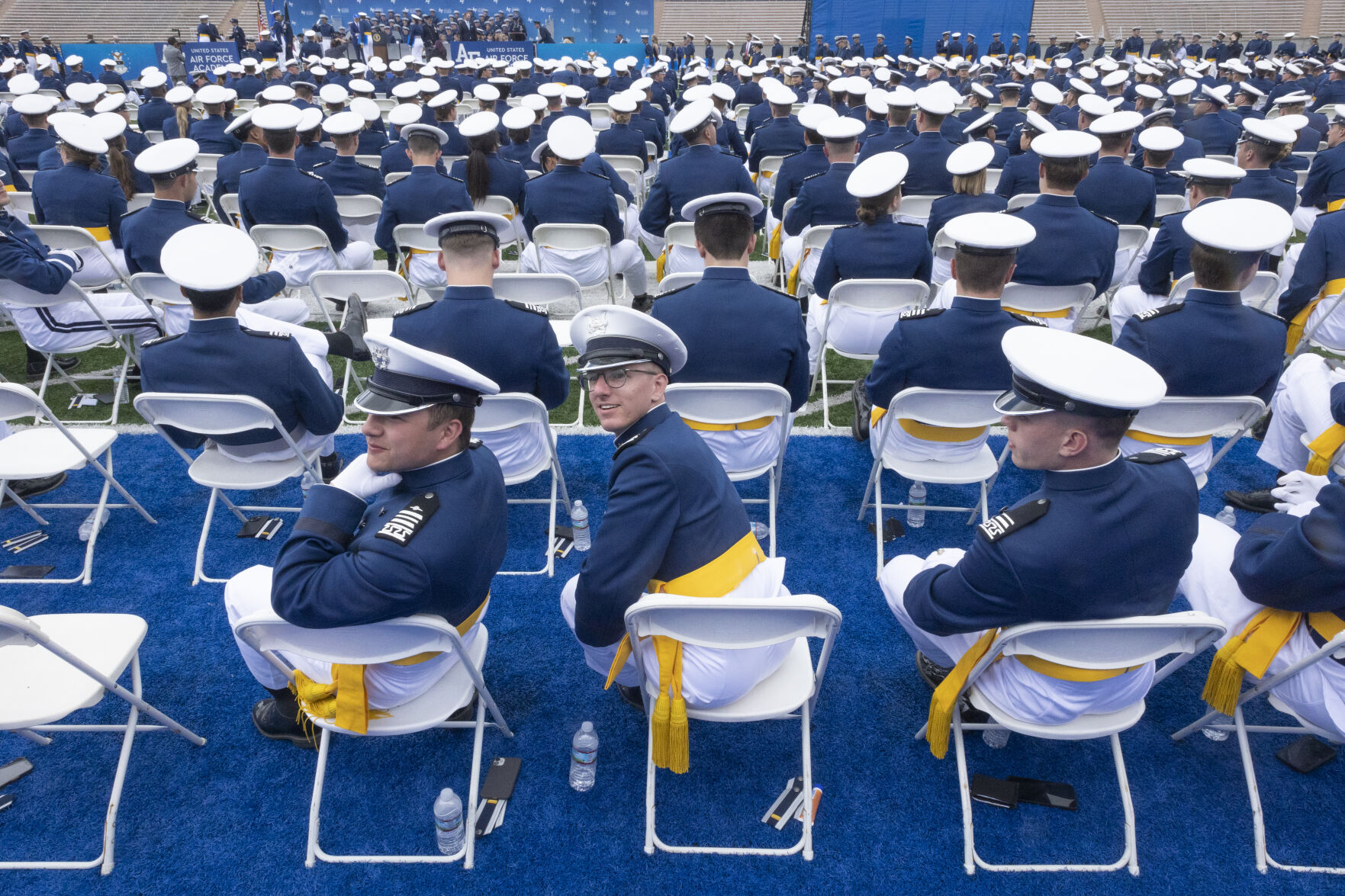 Graduating cadets take a moment to look back to find their friends and family at the U.S. Air Force Academy Class of 2023 Graduation at Falcon Stadium on the U.S. Air Force Academy campus in Colorado Springs, Co., on Thursday, June 1, 2023. (GabiBroekemaPhoto Interngabi.broekema@gazette.comhttps://secure.gravatar.com/avatar/9aa2a13da1acfaa50410cb37bf21fdb1?d=mm&r=g)
