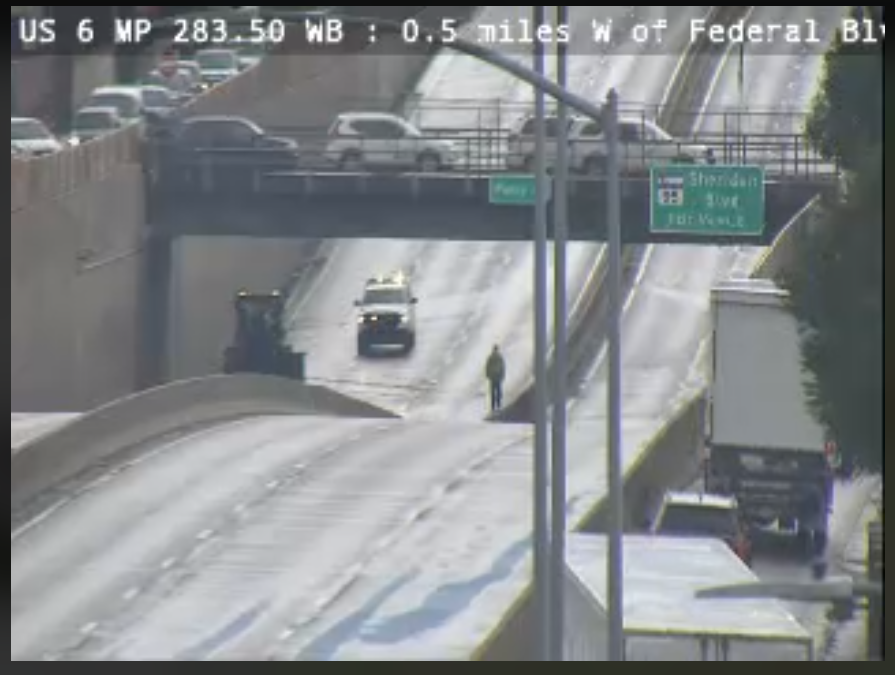 Maintenance crews work clearing US 6 at Perry Street during a closure of the highway due to flooding late Monday morning, June 12, 2023 in Denver, Colorado. Both directions of the highway reopened at about 2:00 p.m. (Colorado Department of Transportation, screenshot)