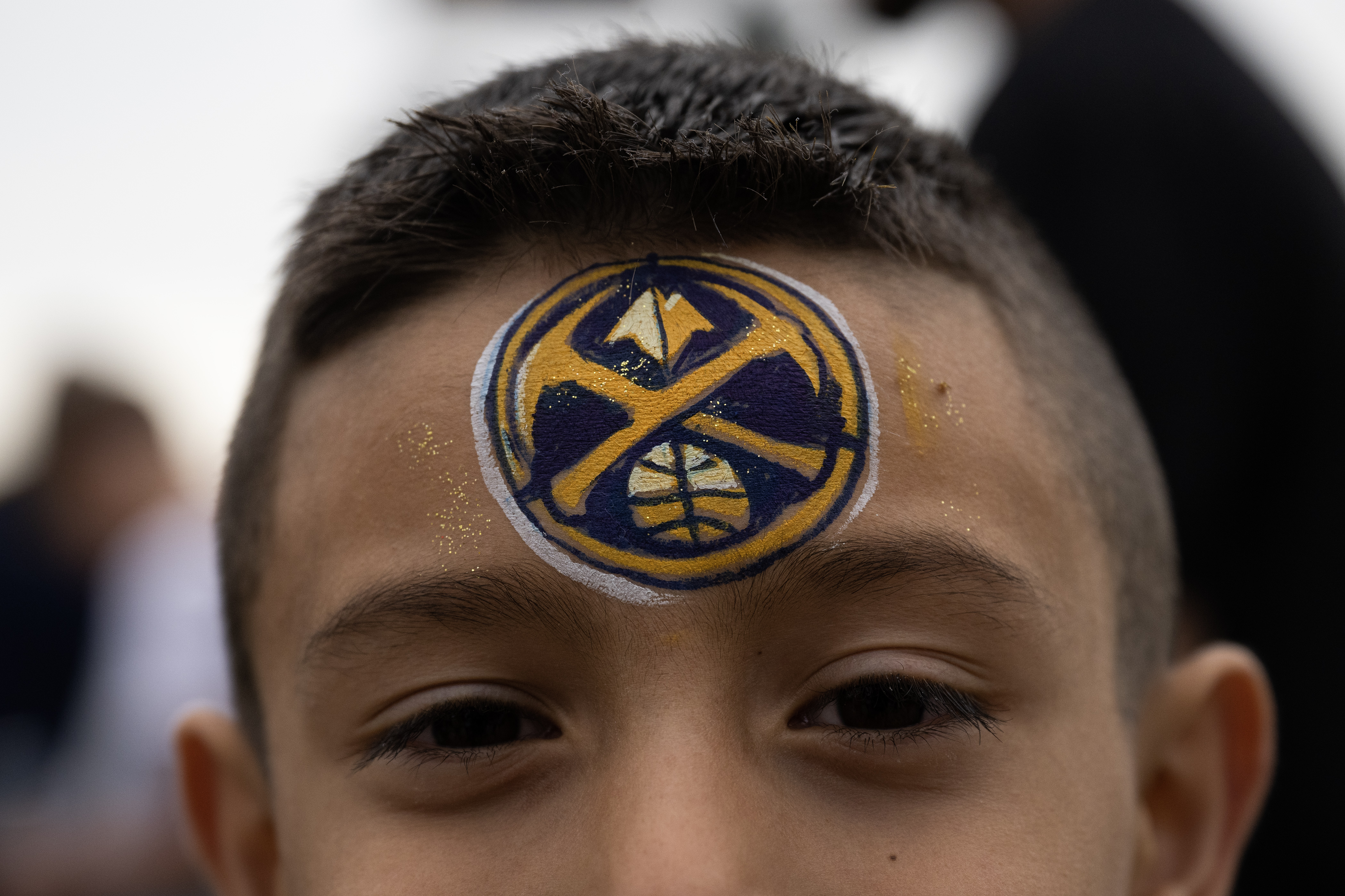 Roman Ramirez, 6, wears a painted Nuggets logo on his forehead before Game 5 of the NBA Finals between the Denver Nuggets and the Miami Heat on Monday, June 12, 2023, at Ball Arena in Denver. (Timothy Hurst/Denver Gazette) (TimHursttim.hurst@gazette.comhttps://secure.gravatar.com/avatar/aca82bd62b4ee425c598527cd6faa1b1?d=mm&r=g)