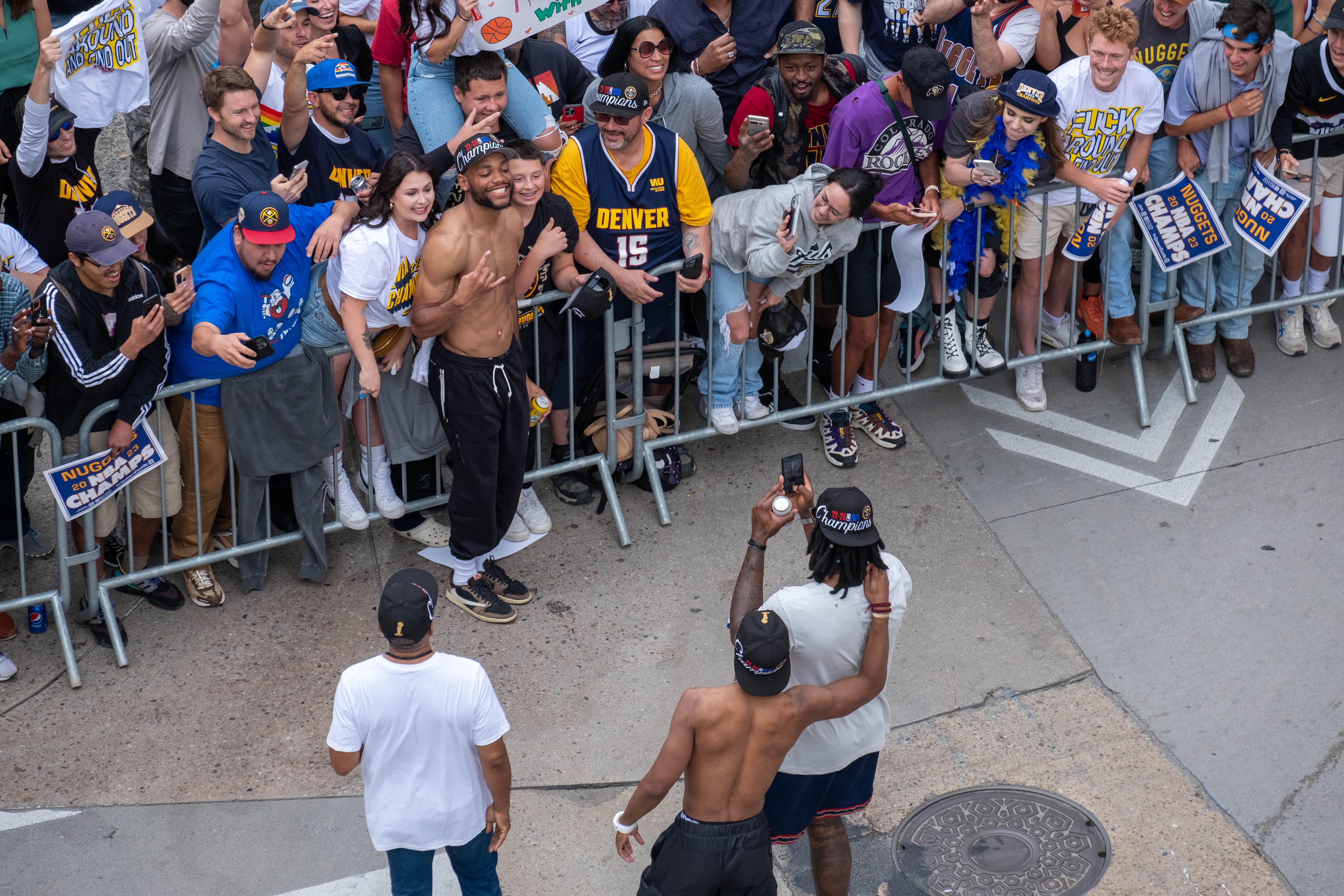 Denver Nuggets Bruce Brown, Jr., upper left, poses with fans as teammate DeAndre Jordan takes a photo during of the team through downtown Denver on Thursday morning, June 15, 2023 through downtown Denver to celebrate the NBA franchise’s first league championship. (JonathanIngrahamDigital Strategistjonathan.ingraham@denvergazette.comhttps://denvergazette.com/content/tncms/avatars/c/dd/7f0/cdd7f086-b693-11ec-b373-bba598953eb6.fc0f5608a6f1144f64f080f771bd904d.png)