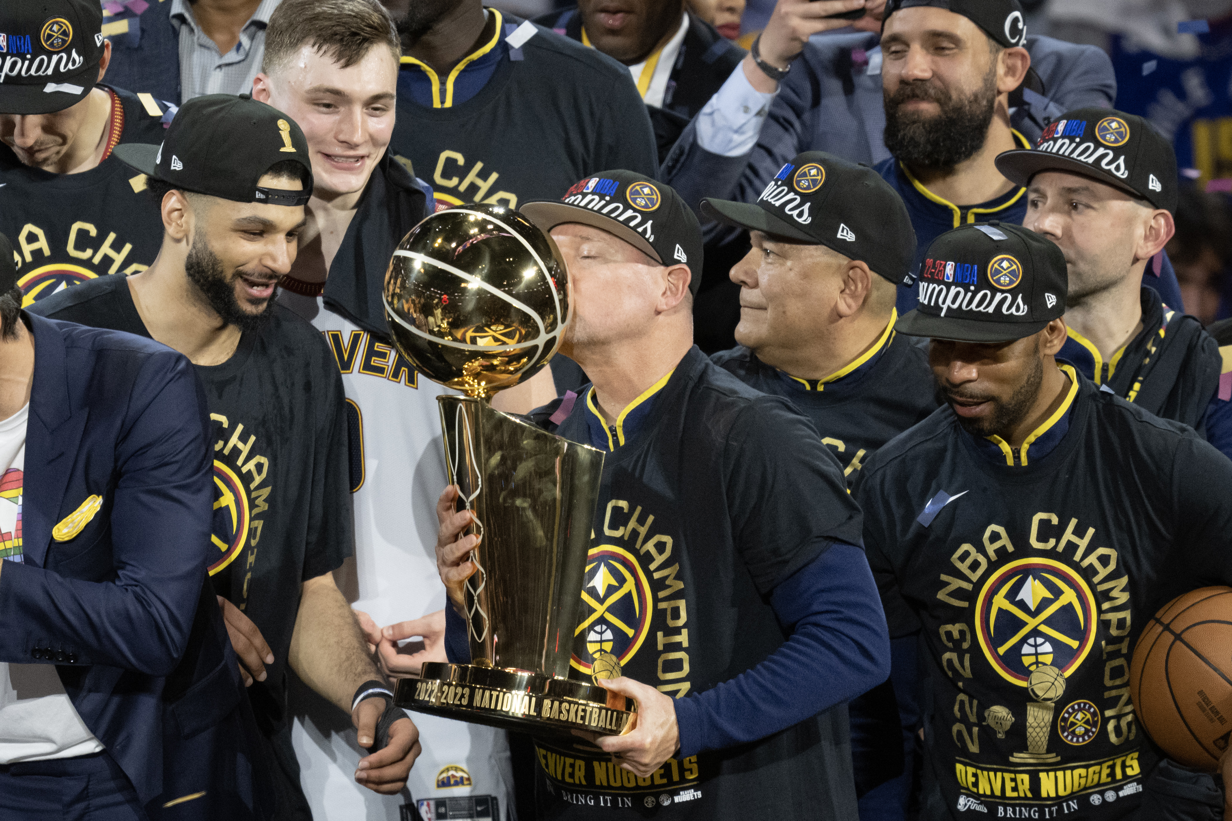 Denver Nuggets head coach Michael Malone kisses the Larry O’Brien Championship Trophy after a 94-89 win over the Miami Heat in Game 5 of the NBA Finals on Monday, June 12, 2023, at Ball Arena in Denver. (Timothy Hurst/Denver Gazette) (TimHursttim.hurst@gazette.comhttps://secure.gravatar.com/avatar/aca82bd62b4ee425c598527cd6faa1b1?d=mm&r=g)