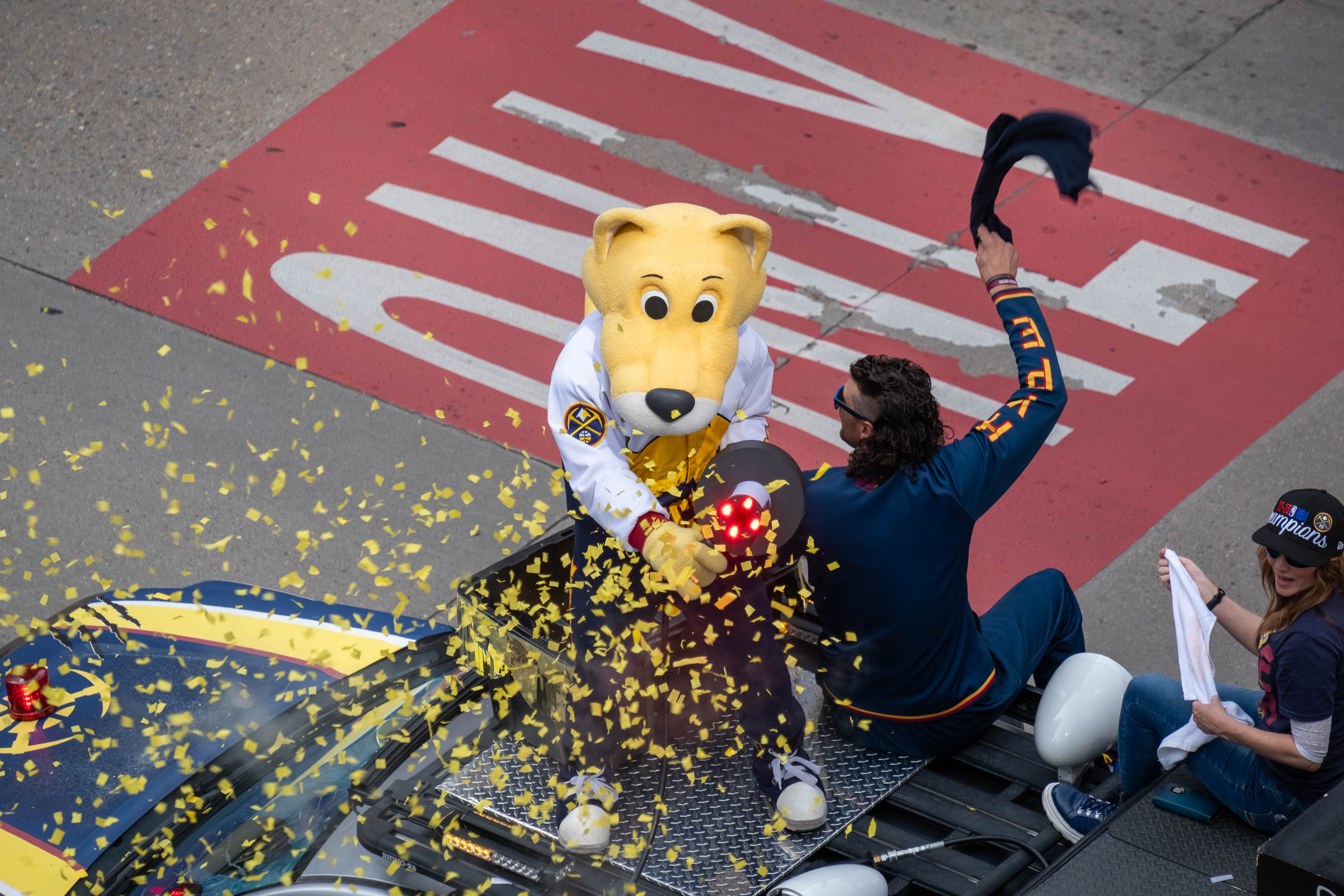 Denver Nuggets mascot “Rocky” amid a burst of confetti as he rides on a Denver Fire Department truck during a parade Thursday morning, June 15, 2023 through downtown Denver to celebrate the NBA franchise’s first league championship. (JonathanIngrahamDigital Strategistjonathan.ingraham@denvergazette.comhttps://denvergazette.com/content/tncms/avatars/c/dd/7f0/cdd7f086-b693-11ec-b373-bba598953eb6.fc0f5608a6f1144f64f080f771bd904d.png)