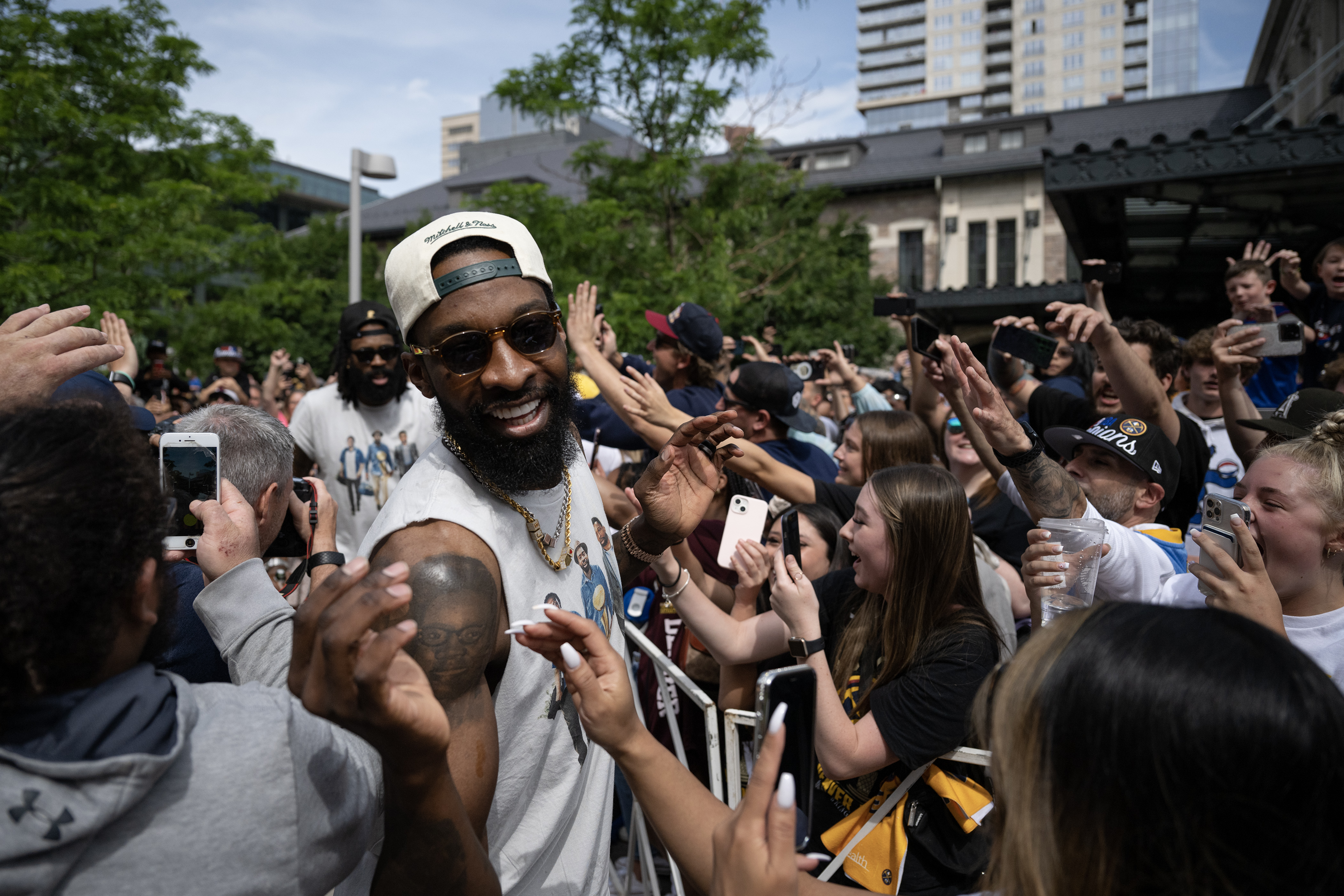 Denver Nuggets forward Jeff Green makes his way through a section of the crowd during the Denver Nuggets 2023 Champions Parade and Rally on Thursday, June 15, 2023, in Denver. (TimHursttim.hurst@gazette.comhttps://secure.gravatar.com/avatar/aca82bd62b4ee425c598527cd6faa1b1?d=mm&r=g)