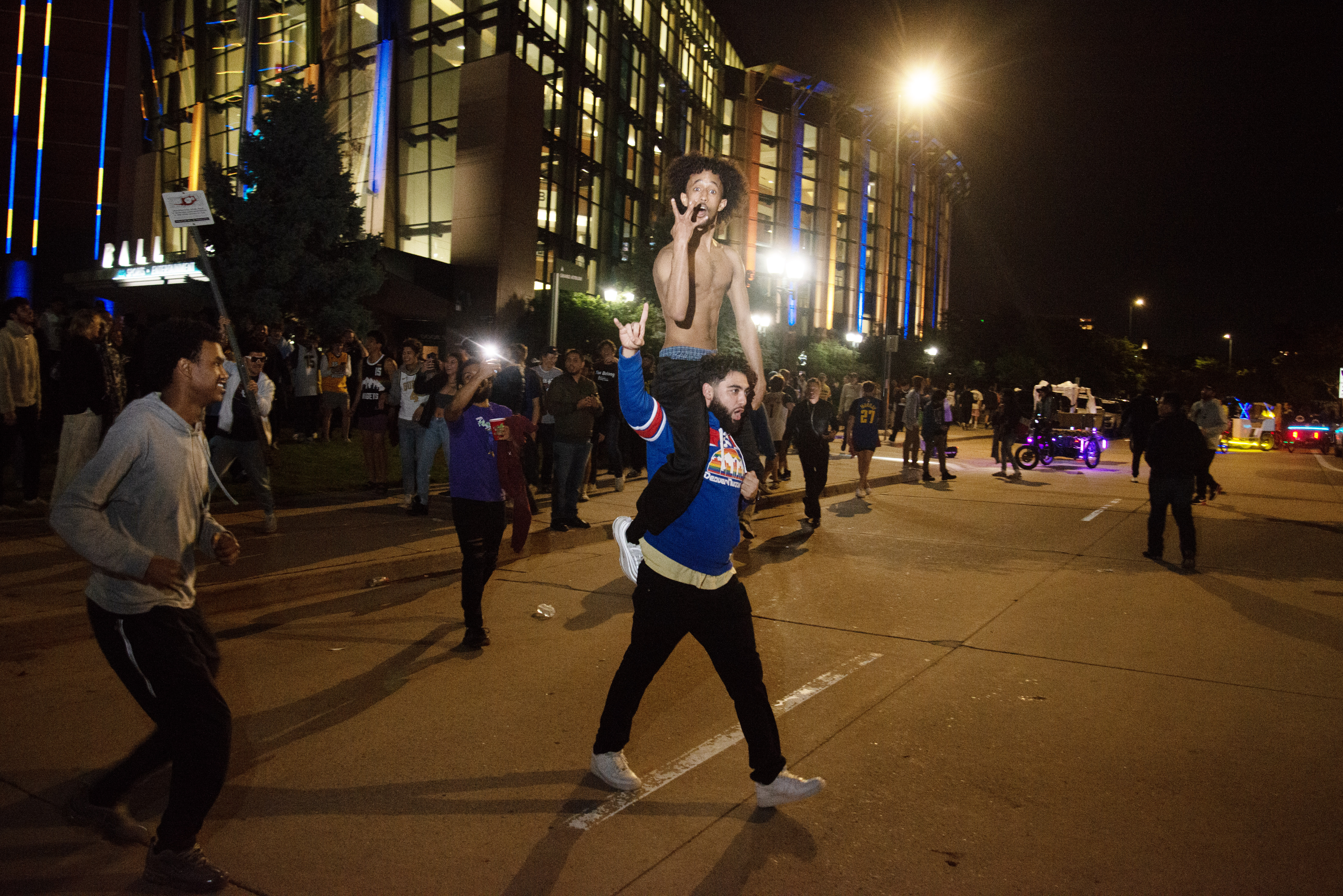 A fan carries another through the street in the moments after the Denver Nuggets first NBA Finals win outside of Ball Arena on June 12, 2023. (TomHellauerMultimedia Producertom.hellauer@denvergazette.comhttps://denvergazette.com/content/tncms/avatars/f/9e/622/f9e6228a-3b6b-11ed-bf10-fbb71fa8e421.f54b911252c540f1d61709edc4727a39.png)