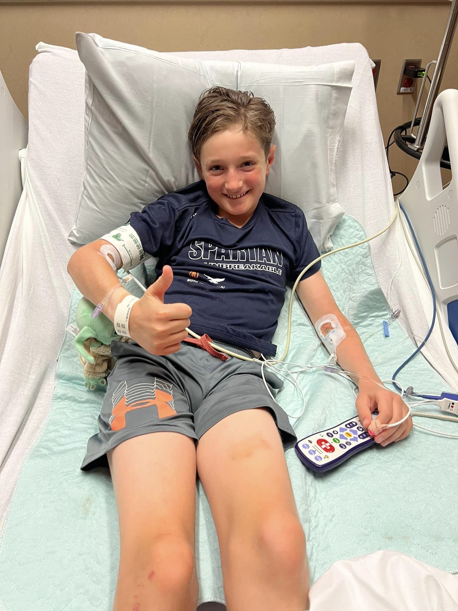Ethan Vogel, 11, is all thumbs up at Anschutz Medical Center after being bitten by a rattlesnake while mountain biking on North Table Mountain in Golden, Colorado, Tuesday, June 6, 2023. (Courtesy, Zach Vogel)