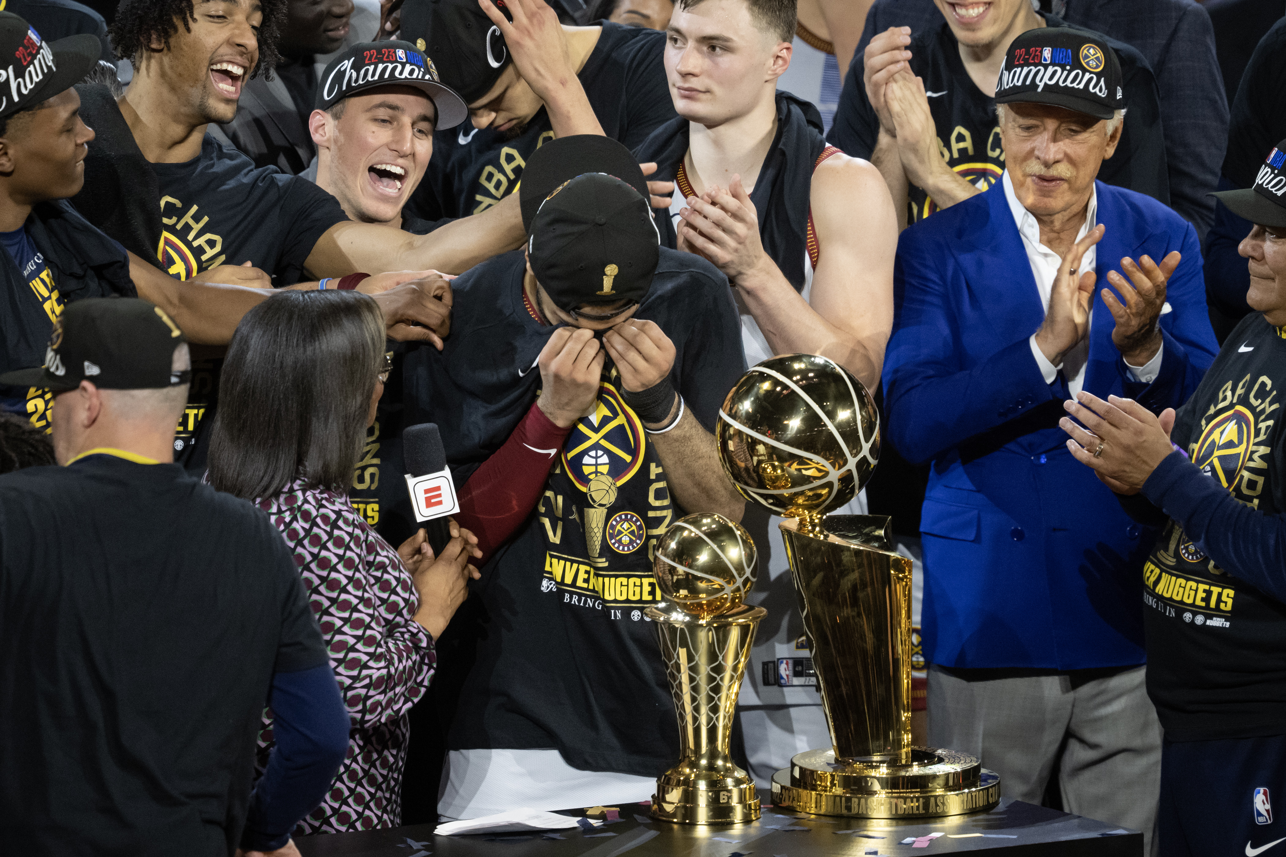 Denver Nuggets guard Jamal Murray (27) tears up as teammates celebrate after a 94-89 win over the Miami Heat in Game 5 of the NBA Finals on Monday, June 12, 2023, at Ball Arena in Denver. (Timothy Hurst/Denver Gazette) (TimHursttim.hurst@gazette.comhttps://secure.gravatar.com/avatar/aca82bd62b4ee425c598527cd6faa1b1?d=mm&r=g)