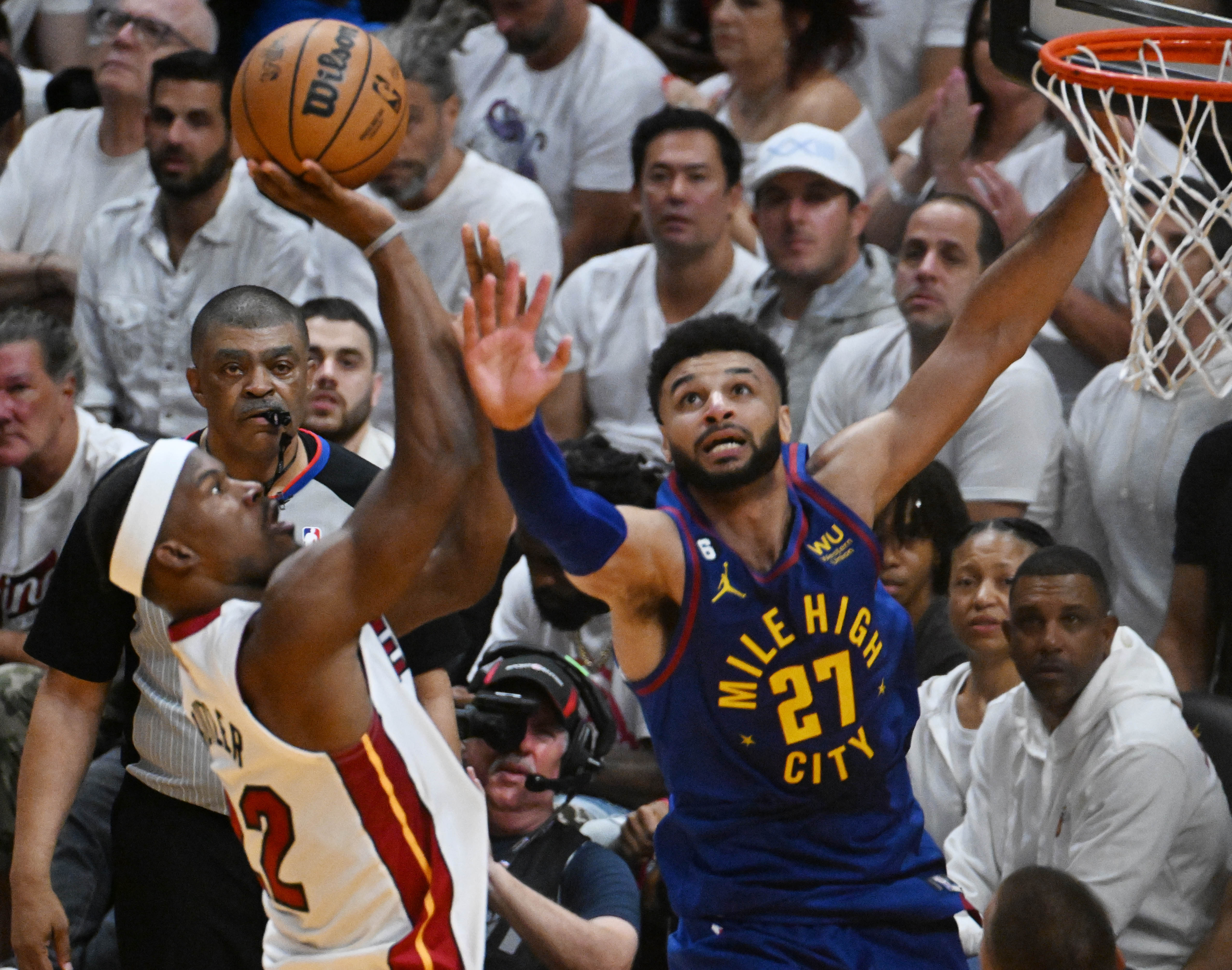Denver Nuggets guard Jamal Murray (27) defends Miami Heat forward Jimmy Butler (22) during the 2nd quarter of the game 3 at at the Kaseya Center in Miami during the first quarter of Game 3 of the NBA Finals on Wednesday, June 7, 2023. (Photo by Jerilee Bennett, The Gazette)