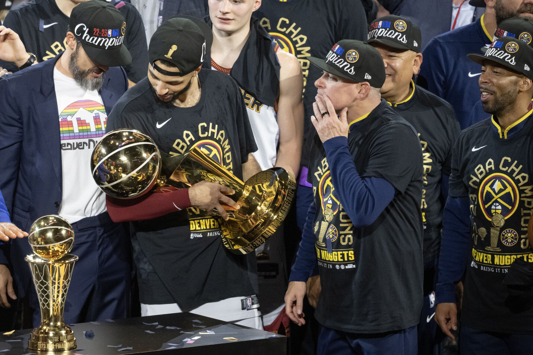 Denver Nuggets guard Jamal Murray (27) cradles the Larry O’Brien Championship Trophy after a 94-89 win over the Miami Heat in Game 5 of the NBA Finals on Monday, June 12, 2023, at Ball Arena in Denver. (Timothy Hurst/Denver Gazette) (TimHursttim.hurst@gazette.comhttps://secure.gravatar.com/avatar/aca82bd62b4ee425c598527cd6faa1b1?d=mm&r=g)