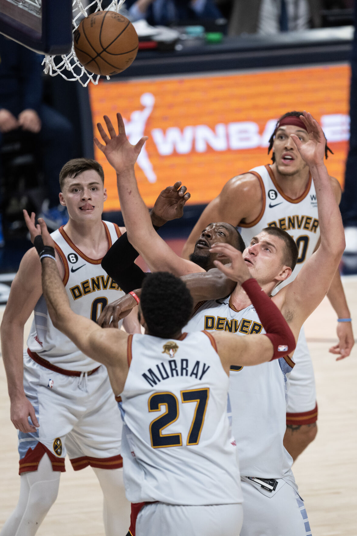 Miami Heat center Bam Adebayo (13) and Denver Nuggets center Nikola Jokic (15) fight for a rebound in a 94-89 Nuggets win in Game 5 of the NBA Finals on Monday, June 12, 2023, at Ball Arena in Denver. (Timothy Hurst/Denver Gazette) (TimHursttim.hurst@gazette.comhttps://secure.gravatar.com/avatar/aca82bd62b4ee425c598527cd6faa1b1?d=mm&r=g)