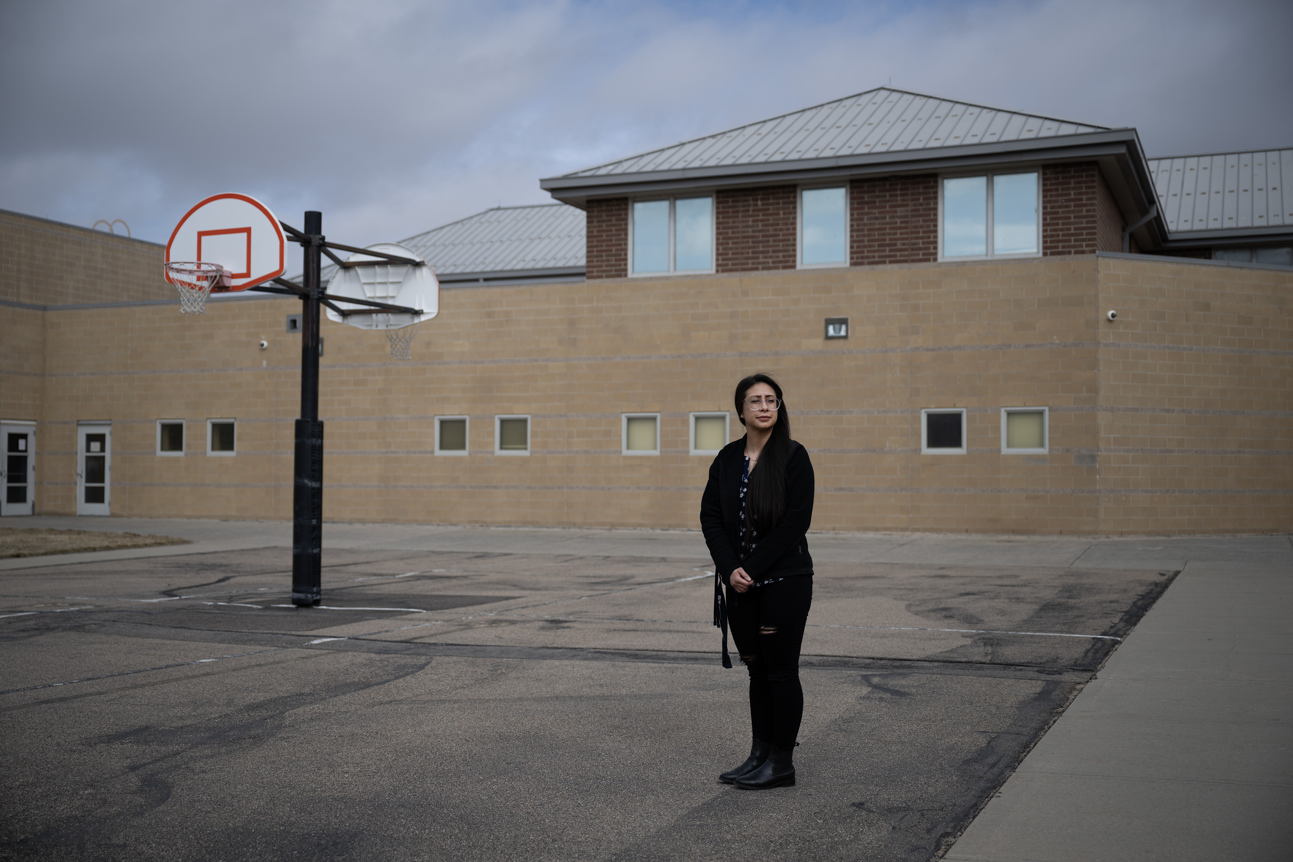 Platte Valley Youth Services youth services specialist Marissa Esquibel stands for a portrait in a courtyard at the facility on Wednesday, March 8, 2023, in Greeley, Colo. (Timothy Hurst/Denver Gazette) (TimHursttim.hurst@gazette.comhttps://secure.gravatar.com/avatar/aca82bd62b4ee425c598527cd6faa1b1?d=mm&r=g)