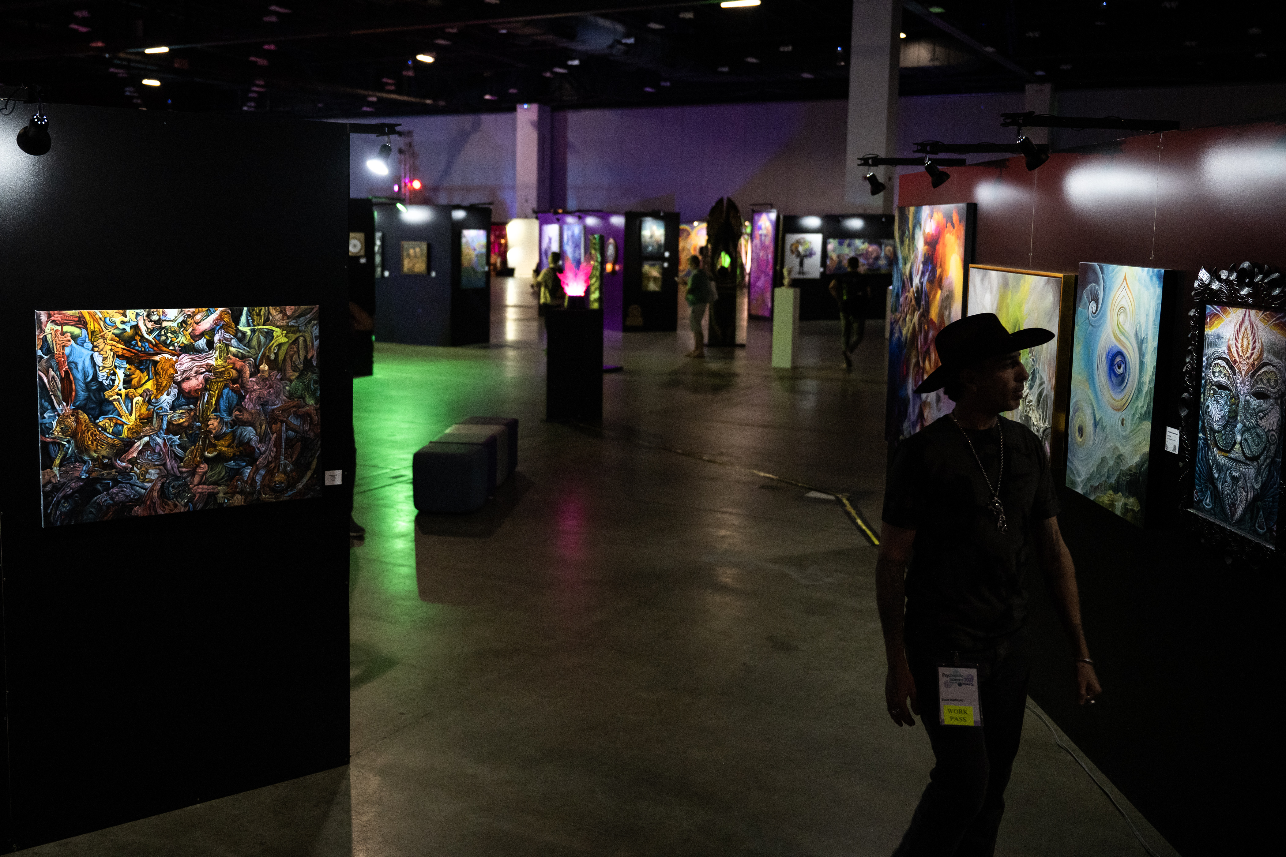 A convention-goer walks through a gallery of psychedelic art during the third day of Psychedelic Science 2023 on Wednesday, June 21, 2023, at the Colorado Convention Center in Denver. (Timothy Hurst/Denver Gazette) (TimHursttim.hurst@gazette.comhttps://secure.gravatar.com/avatar/aca82bd62b4ee425c598527cd6faa1b1?d=mm&r=g)