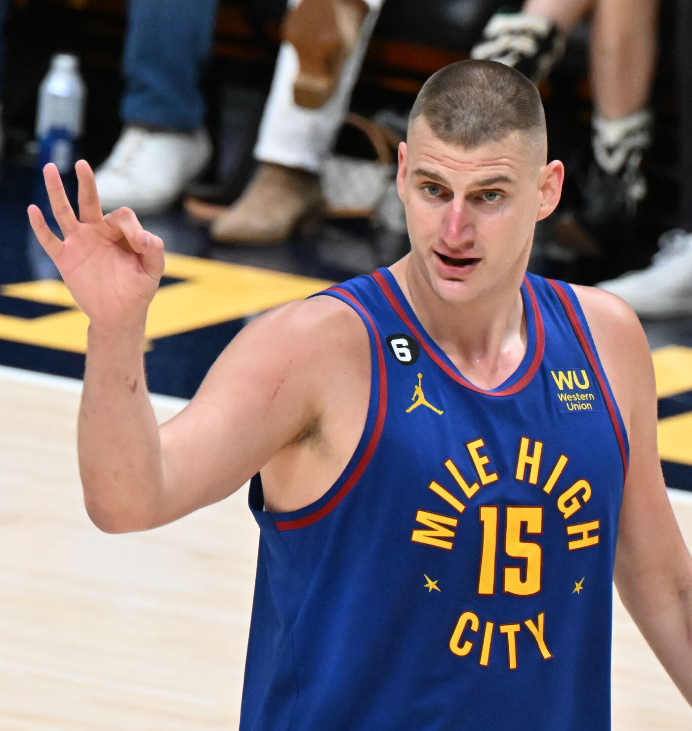 Denver Nuggets center Nikola Jokic (15) gives a sign to the bench during the second quarter of Game 1 of the NBA Finals at Ball Arena on Thursday, June 1, 2023. (Photo by Jerilee Bennett, The Gazette)