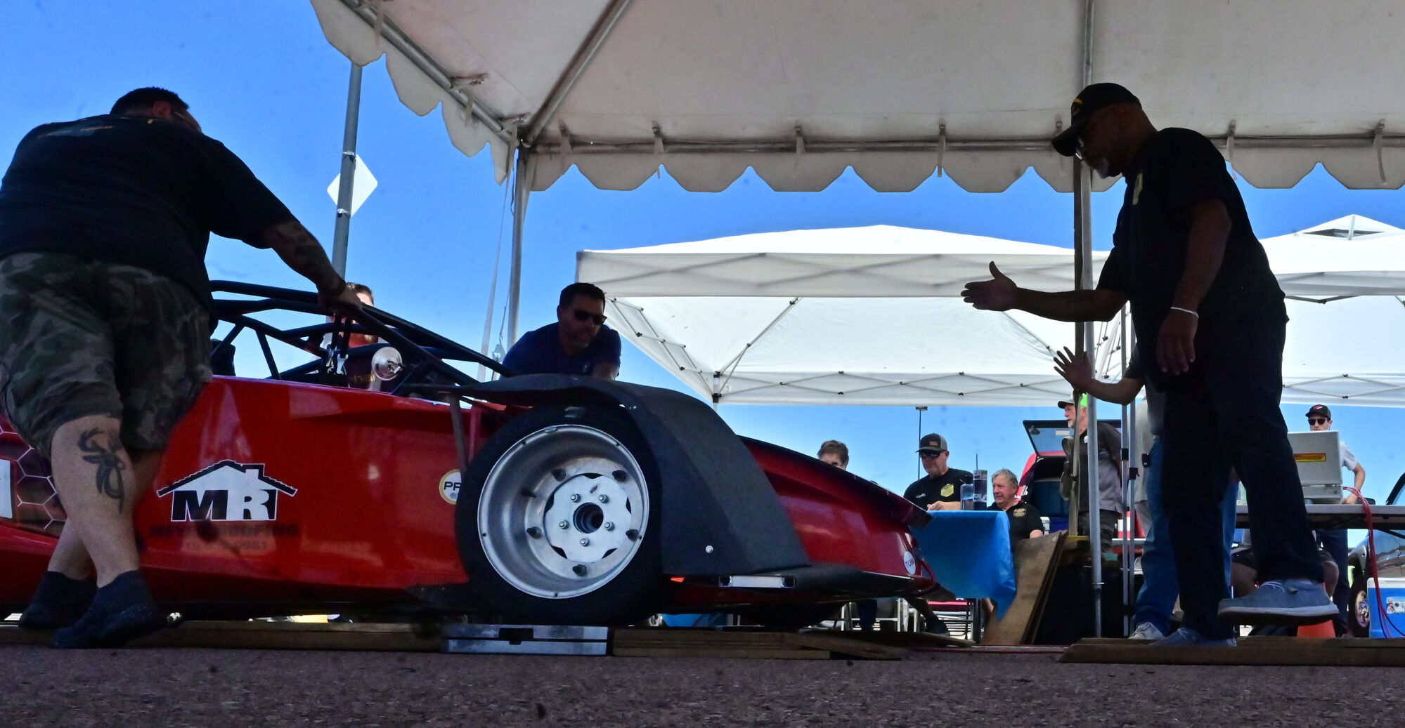 David Meyer’s 2016 Palatov is rolled onto the scales for inspection for this week’s Pikes Peak International Hill Climb. The car will be racing in the Pikes Peak Open division. The inspections were held at the Broadmoor World Arena on Monday, June 19, 2023. Practices and qualifying will be held on Tuesday, Wednesday and Thursday mornings. The Fan Fest will be held downtown on Friday from 5 p.m. to 9 p.m. The race finals will be on Pikes Peak all day Sunday. (Photo by Jerilee Bennett, The Gazette)