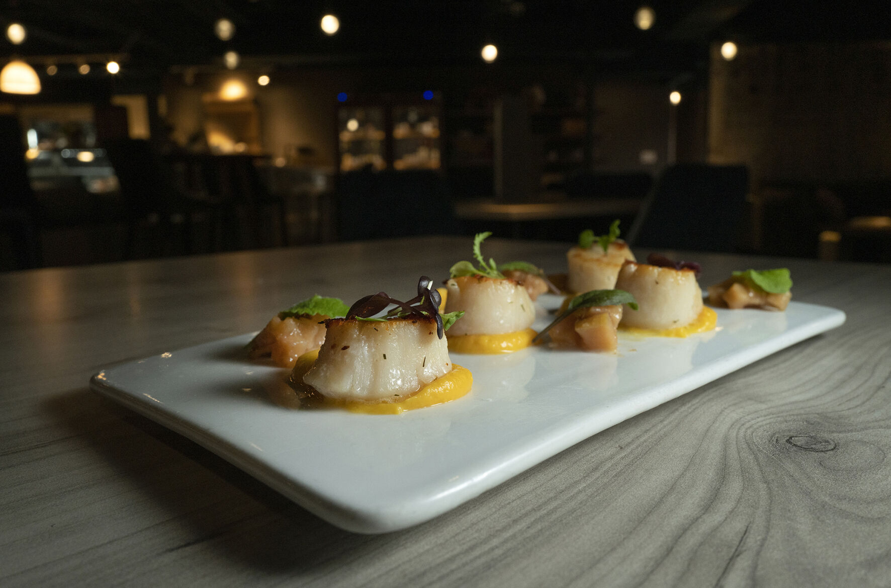Seared scallops at Vine and Wheel. (Jeff Kearney., special to the gazette)
