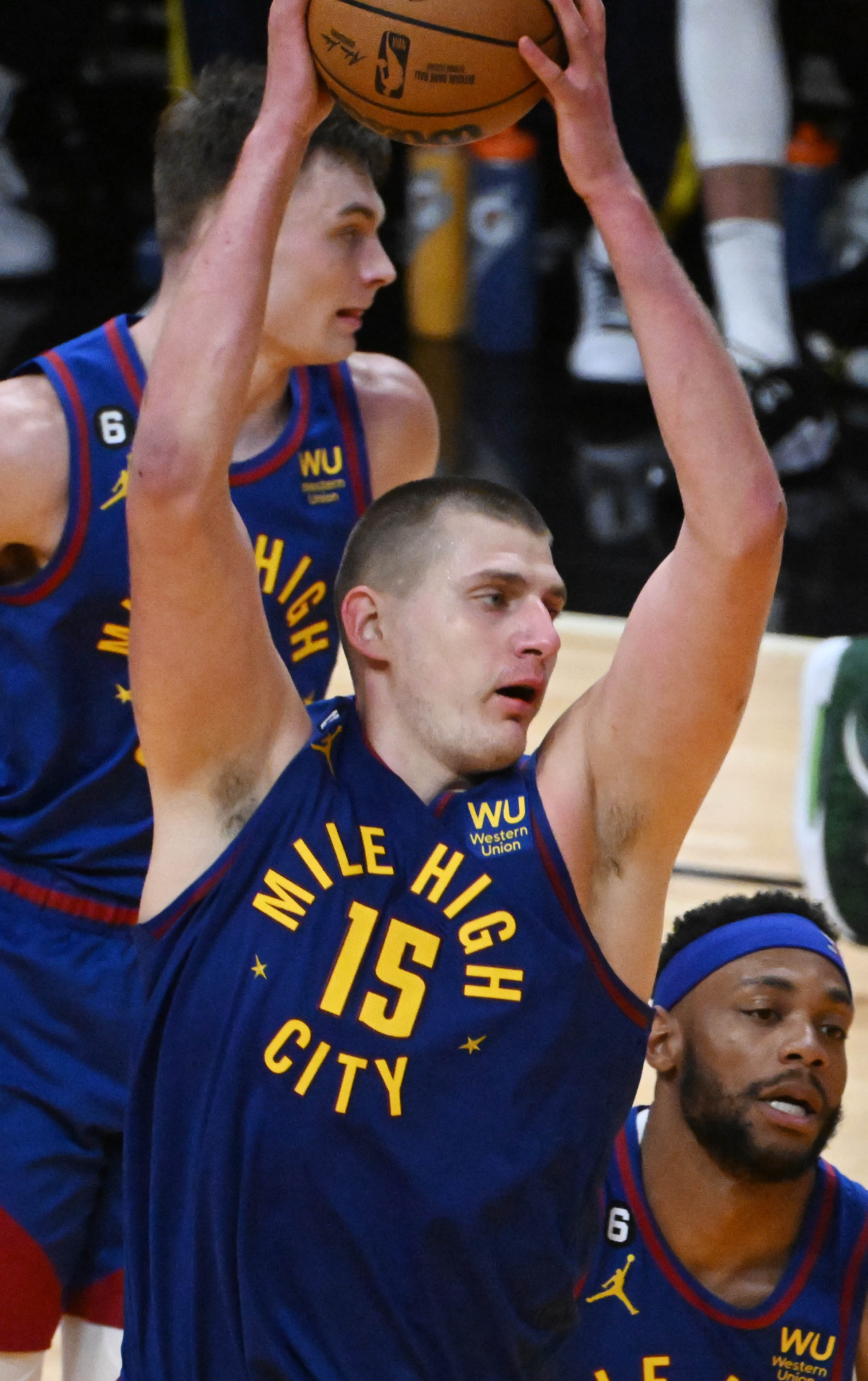 Denver Nuggets center Nikola Jokic (15) pulls down a rebound during game 3 at Kaseya Center in Miami on Wednesday, June 7, 2023. (Photo by Jerilee Bennett, The Gazette)