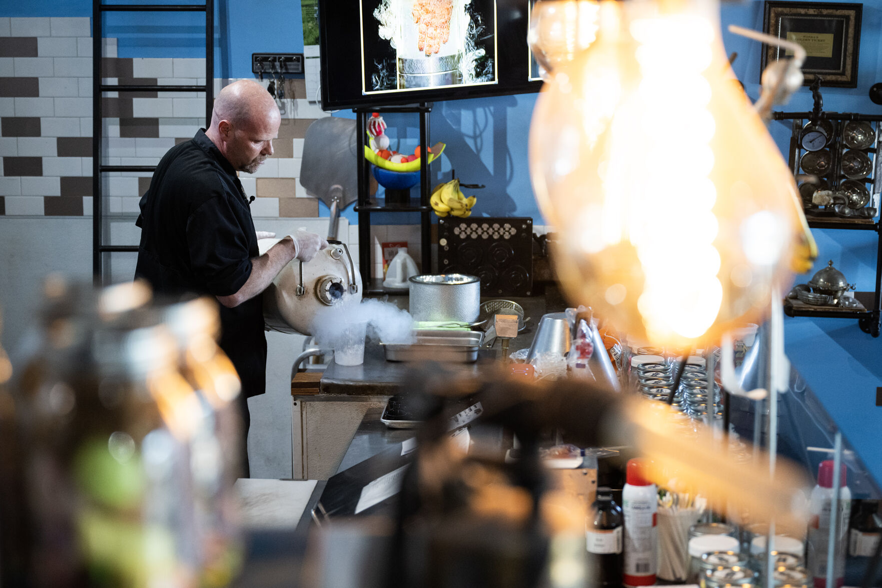 Owner and chef Ian Kleinman pours liquid nitrogen into a cup during a demonstration early this month at The Inventing Room in Denver. (TimHursttim.hurst@gazette.comhttps://secure.gravatar.com/avatar/aca82bd62b4ee425c598527cd6faa1b1?d=mm&r=g)