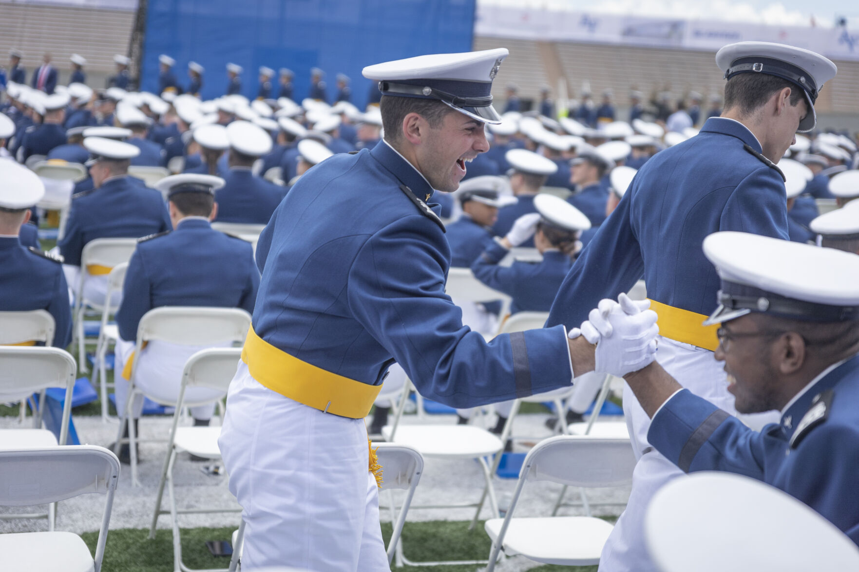Graduating cadets fist bumped and hugged their fellow cadets after receiving their diplomas during the U.S. Air Force Academy Class of 2023 Graduation at Falcon Stadium on the U.S. Air Force Academy campus in Colorado Springs, Co., on Thursday, June 1, 2023. (GabiBroekemaPhoto Interngabi.broekema@gazette.comhttps://secure.gravatar.com/avatar/9aa2a13da1acfaa50410cb37bf21fdb1?d=mm&r=g)