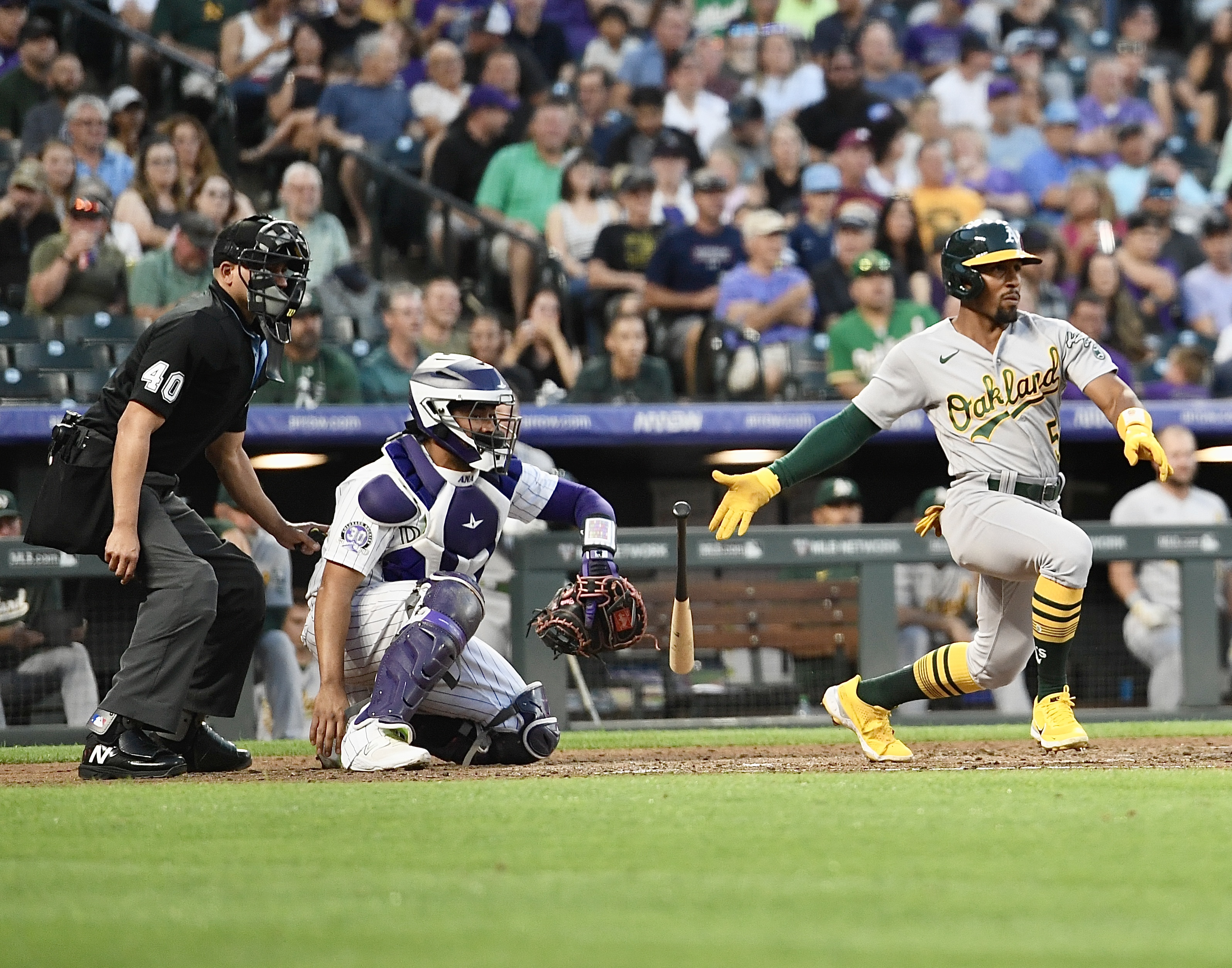 Athletics outfielder Tony Kemp tosses his bat after recording an extra-base hit against the Rockies on Friday, July 28, 2023. (CarsonFieldcarson.field@gazette.comhttps://secure.gravatar.com/avatar/c524ef3d384945349bed78d70eb2d2cd?d=mm&r=g)