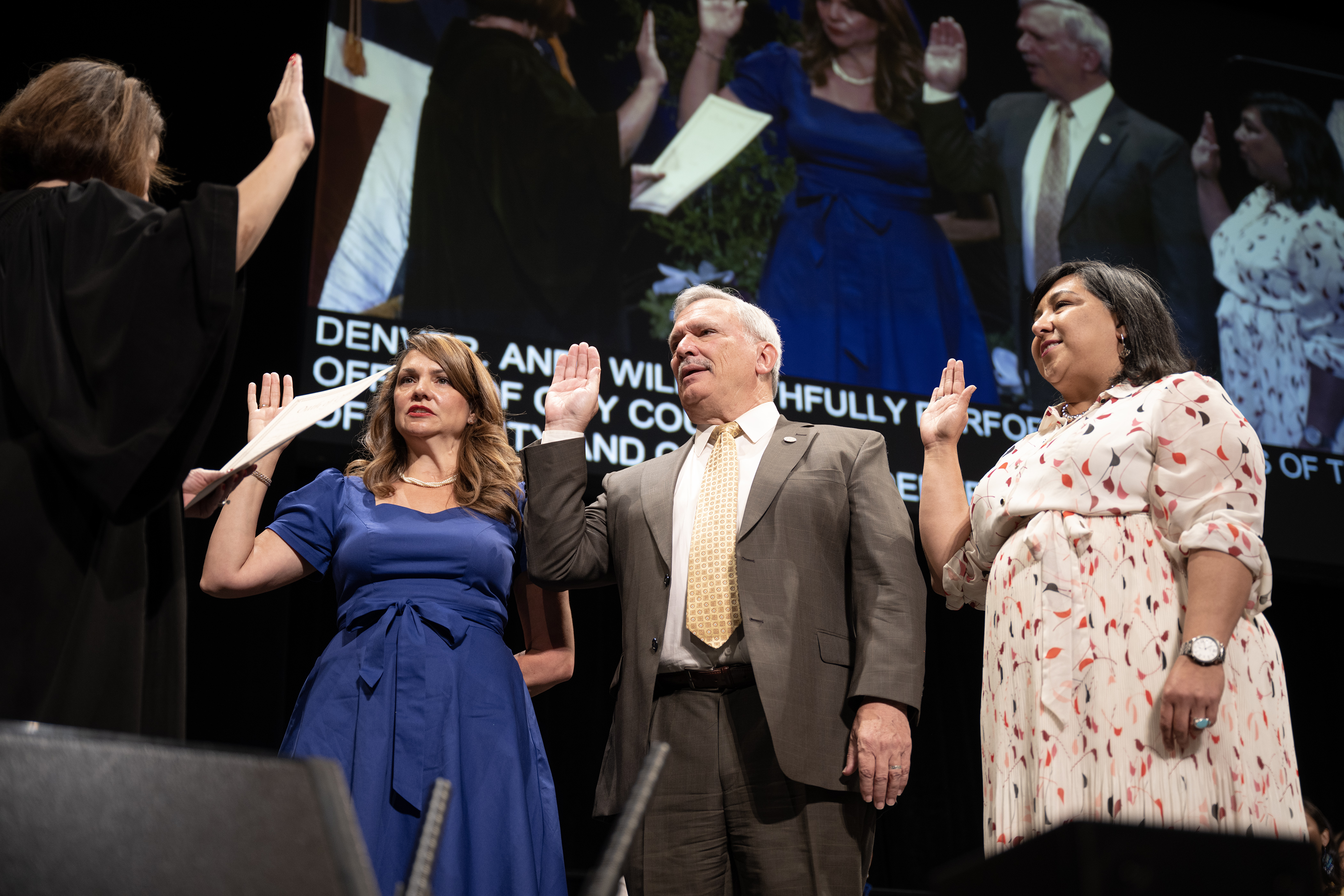 Denver City Council members, from left, Amanda Sandoval, Kevin Flynn and Jaime Torres take the oath of office from Denver District Court presiding judge Nicole M. Rodarte during the inauguration ceremony for Denver city and county elected officials on Monday, July 17, 2023, at the Ellie Caulkins Opera House in Denver, Colo. (Timothy Hurst/Denver Gazette) (TimHursttim.hurst@gazette.comhttps://secure.gravatar.com/avatar/aca82bd62b4ee425c598527cd6faa1b1?d=mm&r=g)