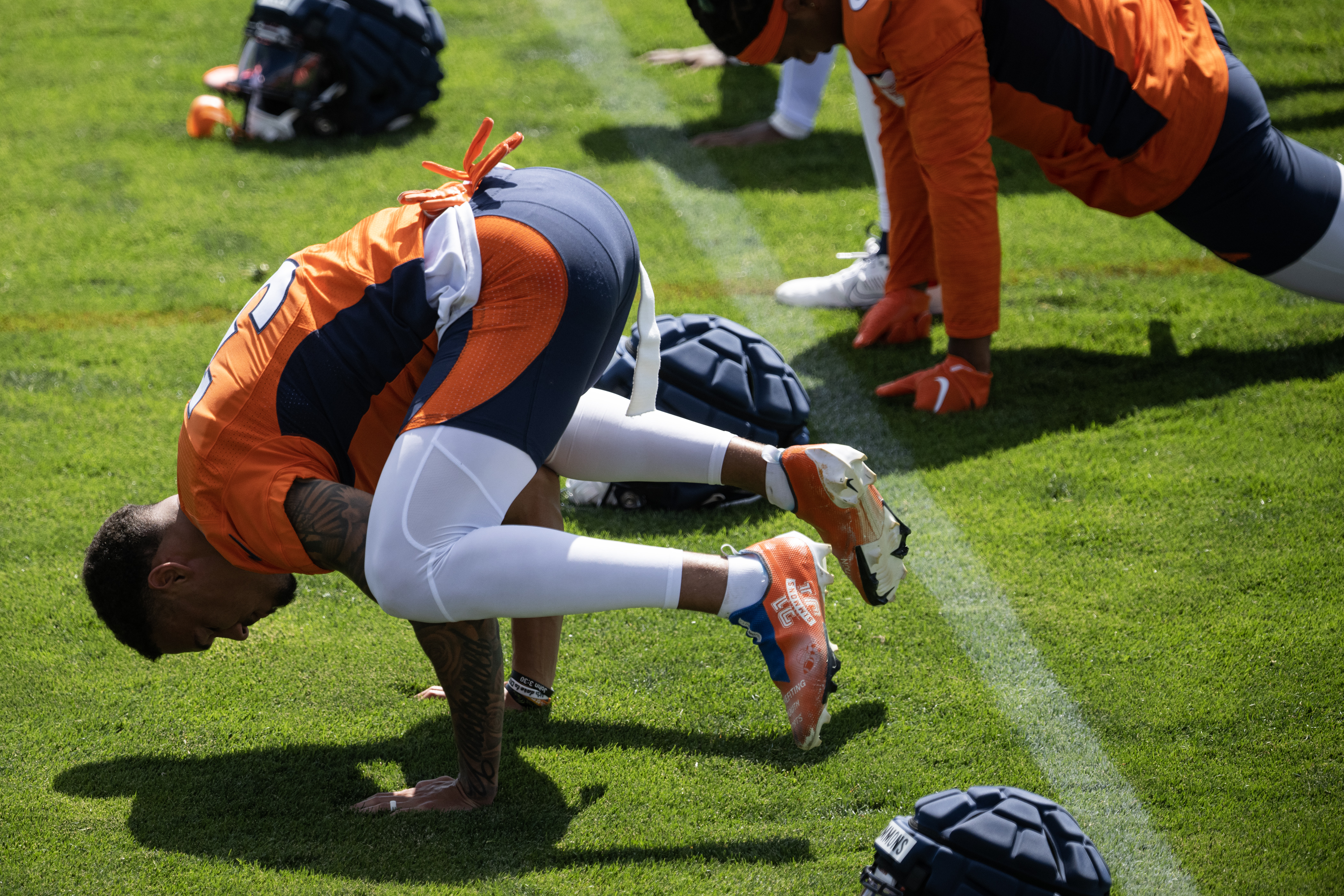 Denver Broncos safety Justin Simmons (31) balances on his hands during training camp on Friday, July 28, 2023, at the Centura Health Training Center in Centennial, Colo. (Timothy Hurst/Denver Gazette) (TimHursttim.hurst@gazette.comhttps://secure.gravatar.com/avatar/aca82bd62b4ee425c598527cd6faa1b1?d=mm&r=g)