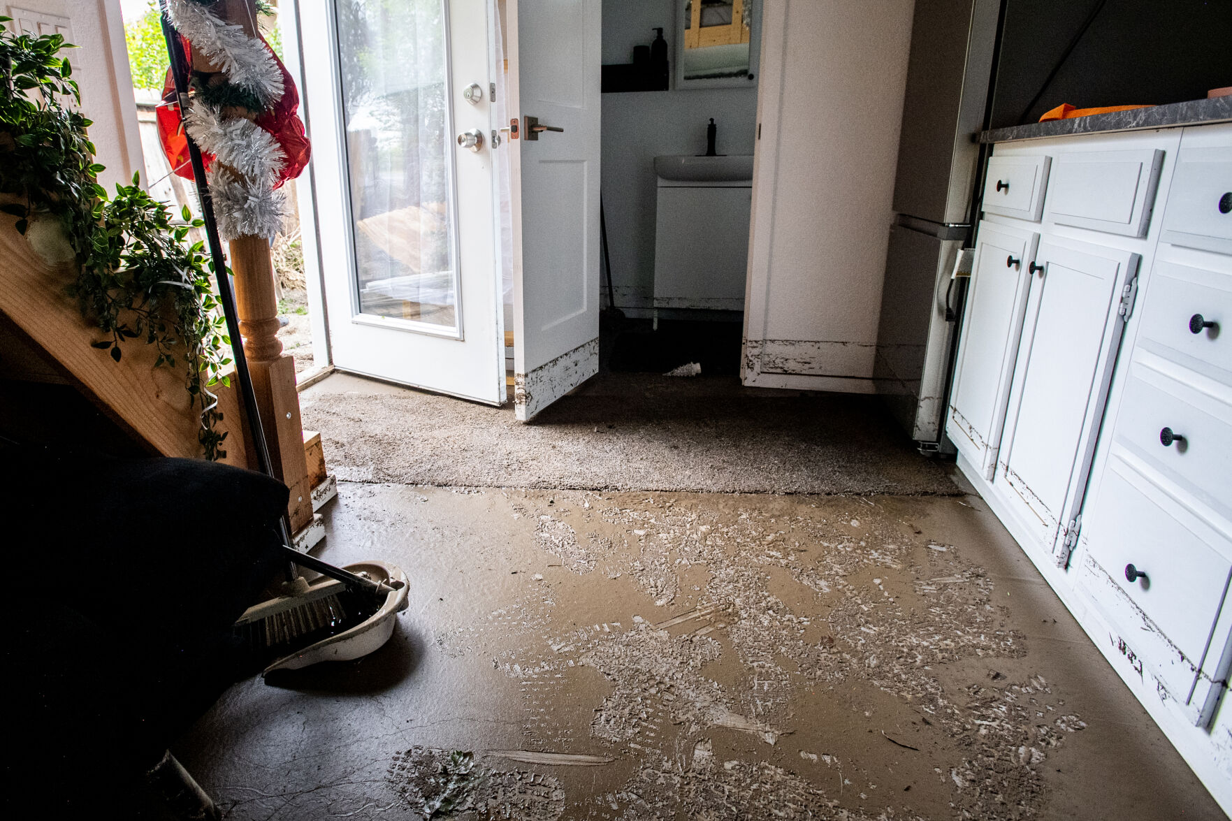 Mud coats the floor of a newly finished accessory dwelling unit that suffered damage after stormwater flood in mid-June. (photos by Parker Seibold, the gazette)
