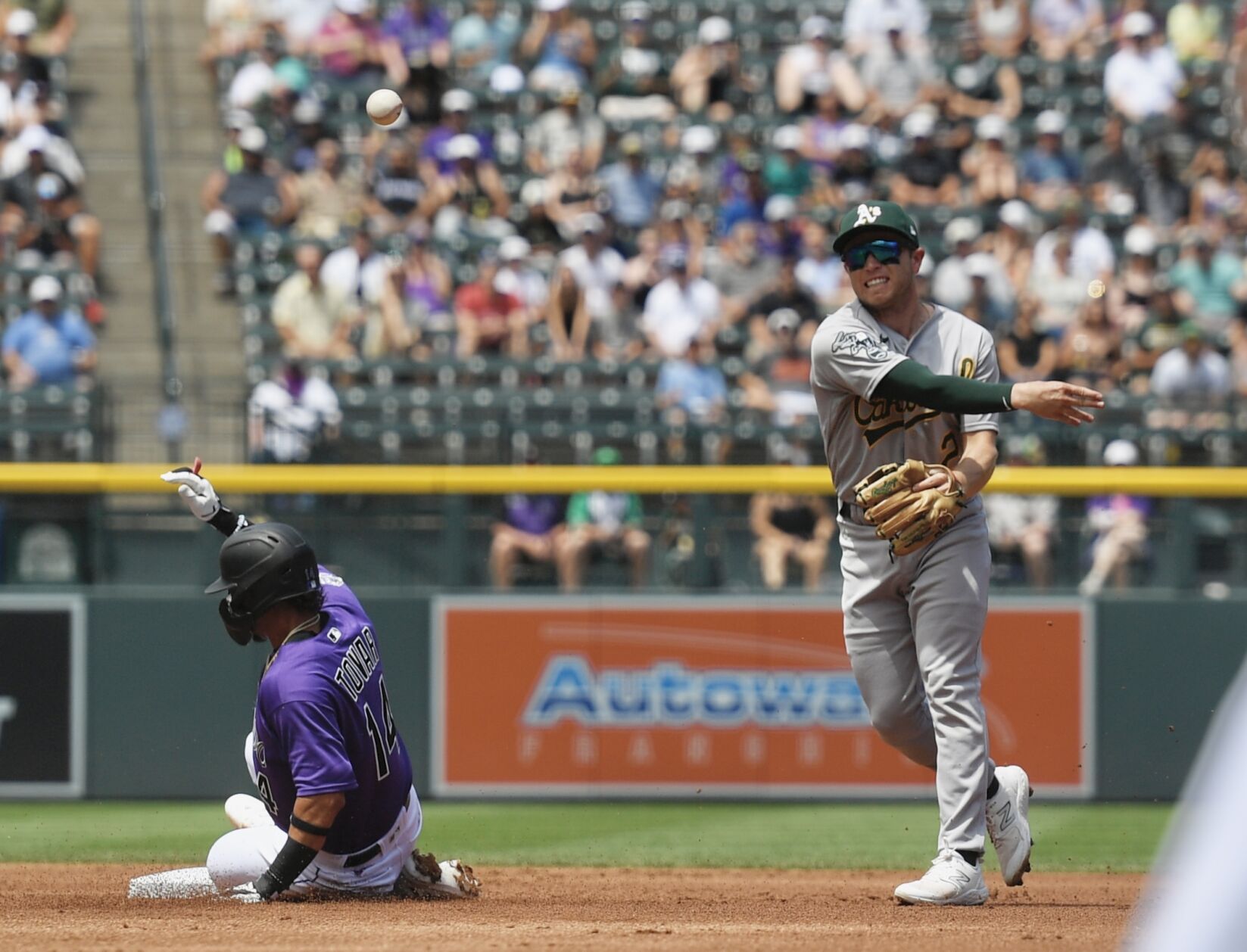 A's infielder Nick Allen throws to first against the Rockies on Sunday, July 30, 2023. (CarsonFieldcarson.field@gazette.comhttps://secure.gravatar.com/avatar/c524ef3d384945349bed78d70eb2d2cd?d=mm&r=g)