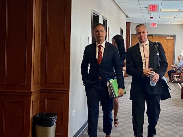 Prosecutors John Kelnner (18th Judicial District Attorney) and Michael Morrow, leave the courtroom on a break during Wednesday's preliminary hearing for James Craig. (CarolMcKinleyDenver Enterprise Reportercarol.mckinley@gazette.comhttps://denvergazette.com/content/tncms/avatars/5/c3/a0f/5c3a0fbe-1007-11ec-9e18-b7f42cfa4b0f.9565a0ce58866e86bcf18260621c2a46.png)