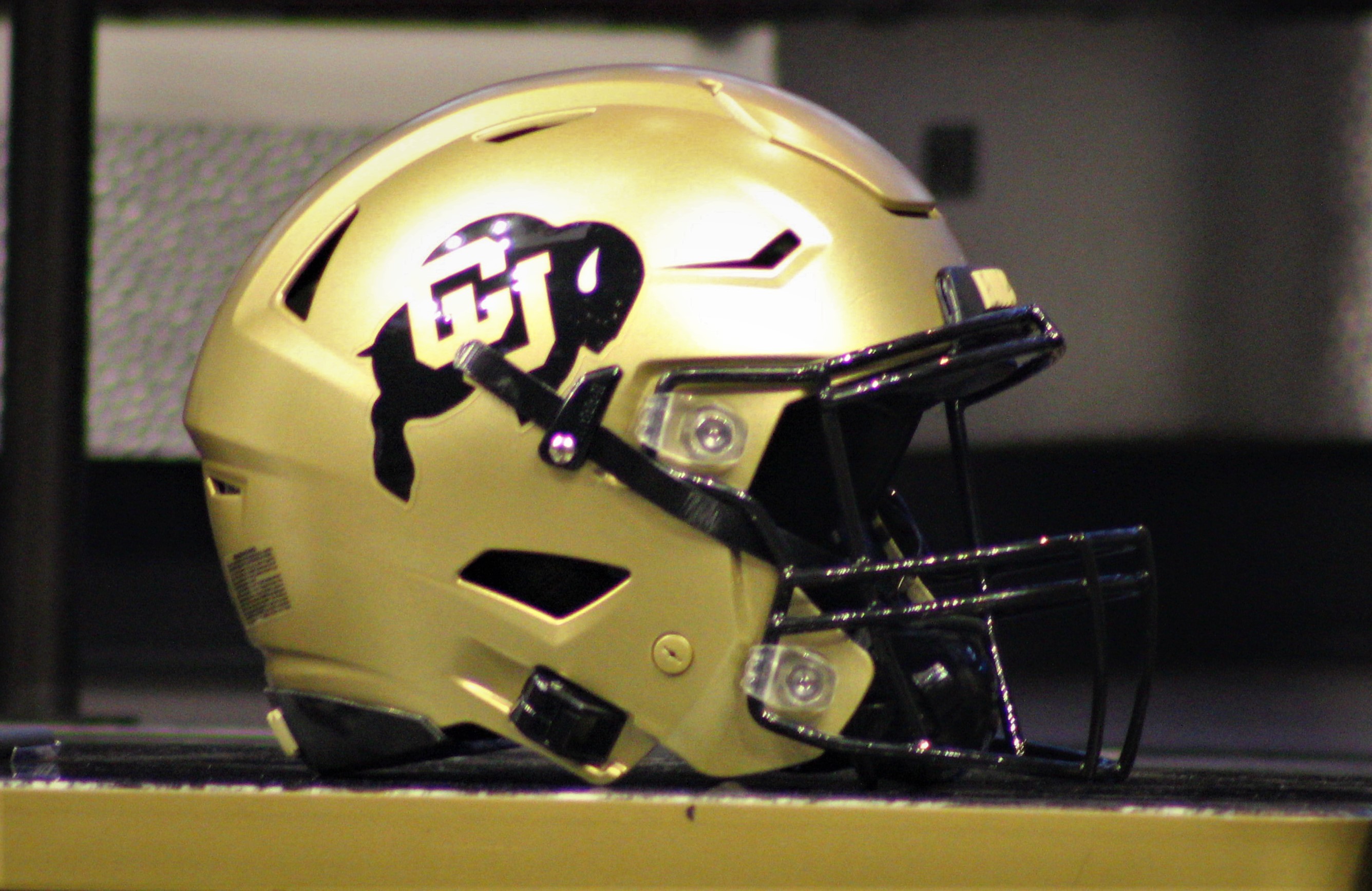 A Colorado football helmet is on display on the main stage during Pac-12 media day on Friday, July 21, 2023 at Resorts World in Las Vegas. (Tyler King, The Denver Gazette)