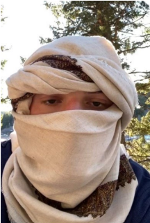 This still photo allegedly shows Davin Meyer, 18, in a video pledging allegiance to an Islamic State group leader late in 2022. (Photo from Davin Meyer's arrest affidavit)