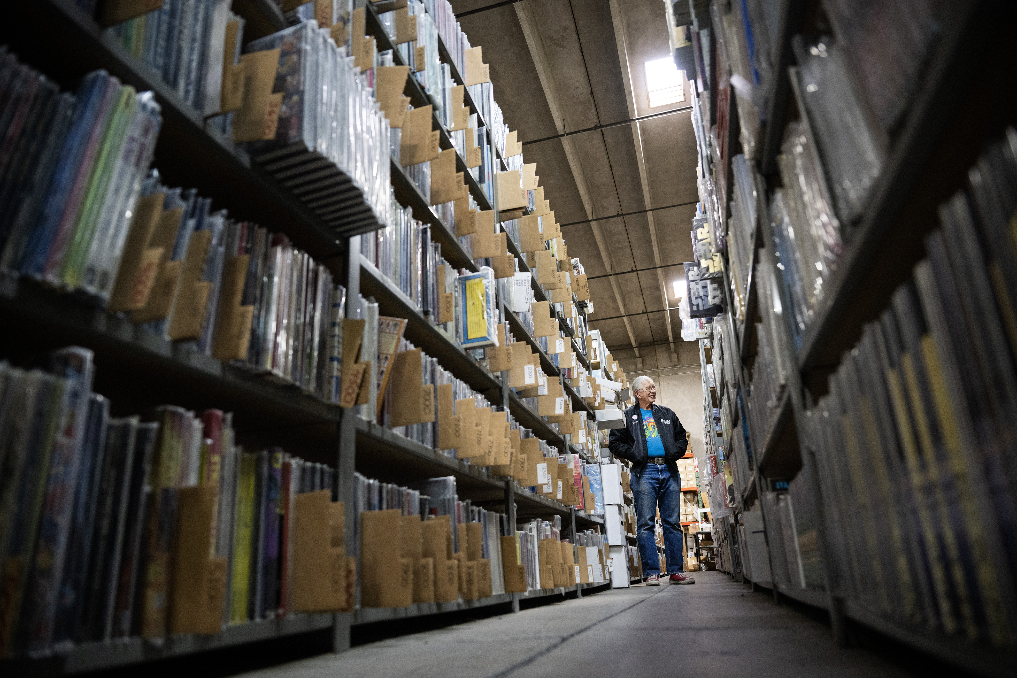 President and founder Chuck Rozanski stands between two of the many shelves holding archived books that aren’t on display in the warehouse on Saturday, Feb. 11, 2023, at the Mile High Comics Jason Street Mega Store in Denver, Colo. (Timothy Hurst/Denver Gazette) (TimHursttim.hurst@gazette.comhttps://secure.gravatar.com/avatar/aca82bd62b4ee425c598527cd6faa1b1?d=mm&r=g)
