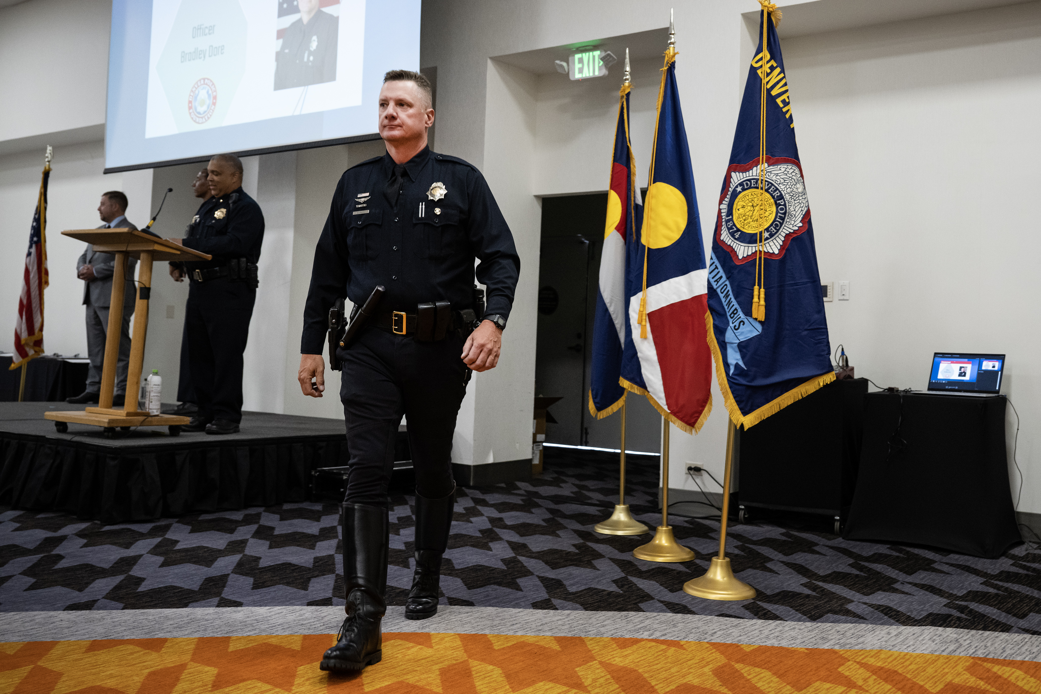 Denver Police Department officer Bradley Dore walks back to his seat after receiving the Lifesaver award during the Denver Police Foundation Award Ceremony on Monday, July 24, 2023, at The Curtis Hotel in Denver, Colo. (Timothy Hurst/Denver Gazette) (TimHursttim.hurst@gazette.comhttps://secure.gravatar.com/avatar/aca82bd62b4ee425c598527cd6faa1b1?d=mm&r=g)