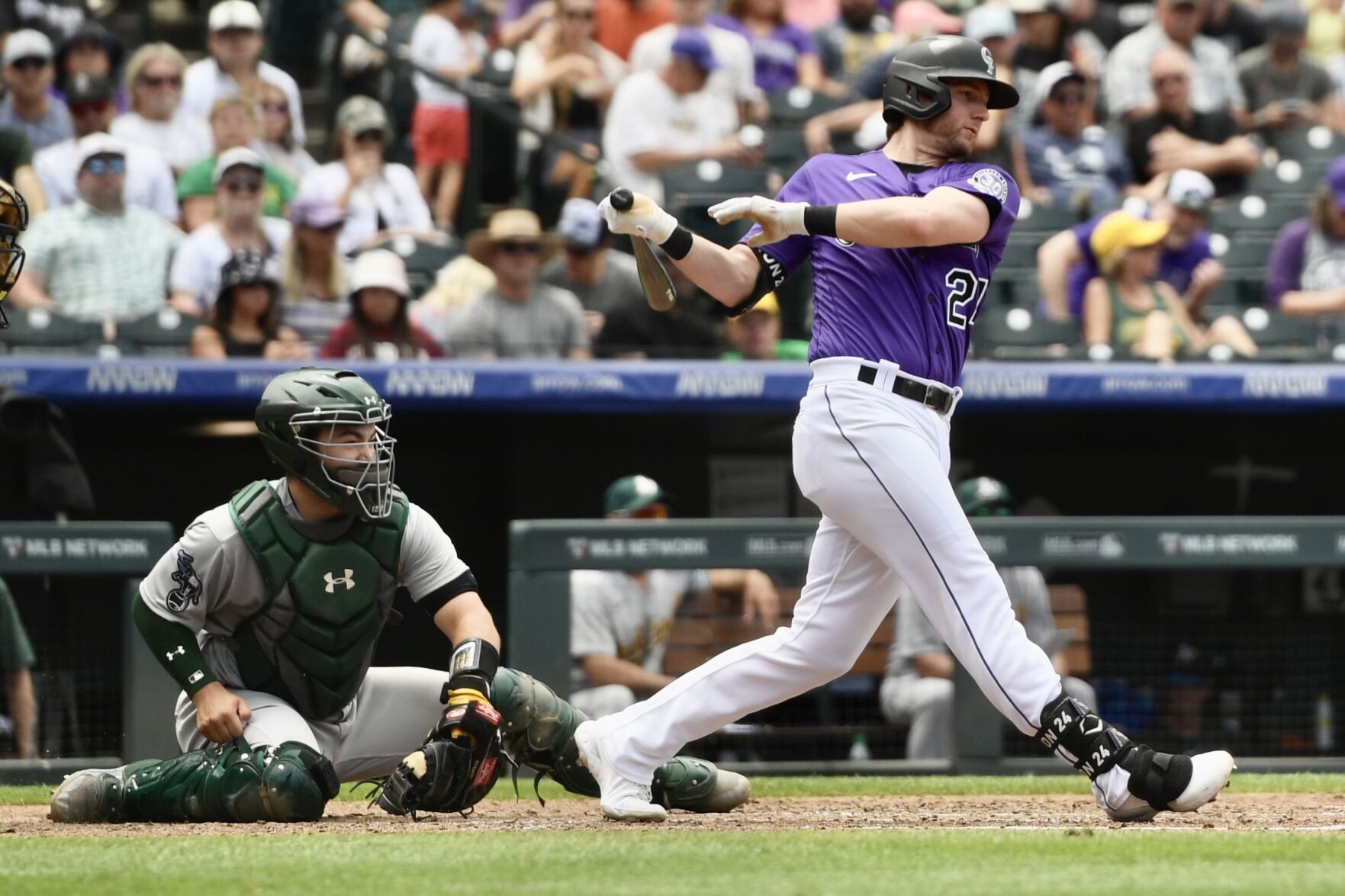 Rockies infielder Ryan McMahon swings against the Oakland Athletics on Saturday, July 30, 2023. (CarsonFieldcarson.field@gazette.comhttps://secure.gravatar.com/avatar/c524ef3d384945349bed78d70eb2d2cd?d=mm&r=g)