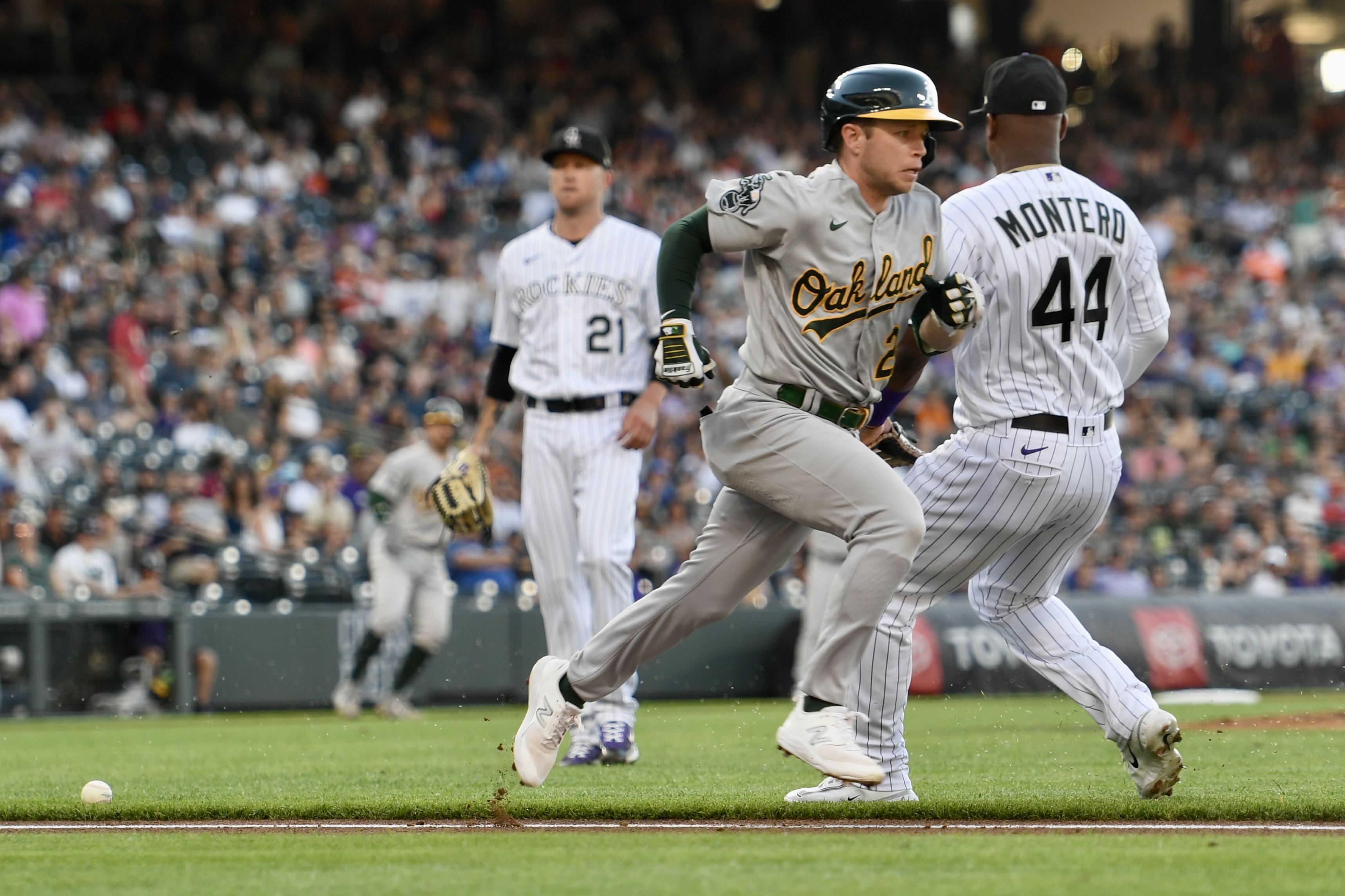 A's shortstop Nick Allen reaches on an infield hit against the Colorado Rockies on Friday, July 28, 2023. (CarsonFieldcarson.field@gazette.comhttps://secure.gravatar.com/avatar/c524ef3d384945349bed78d70eb2d2cd?d=mm&r=g)