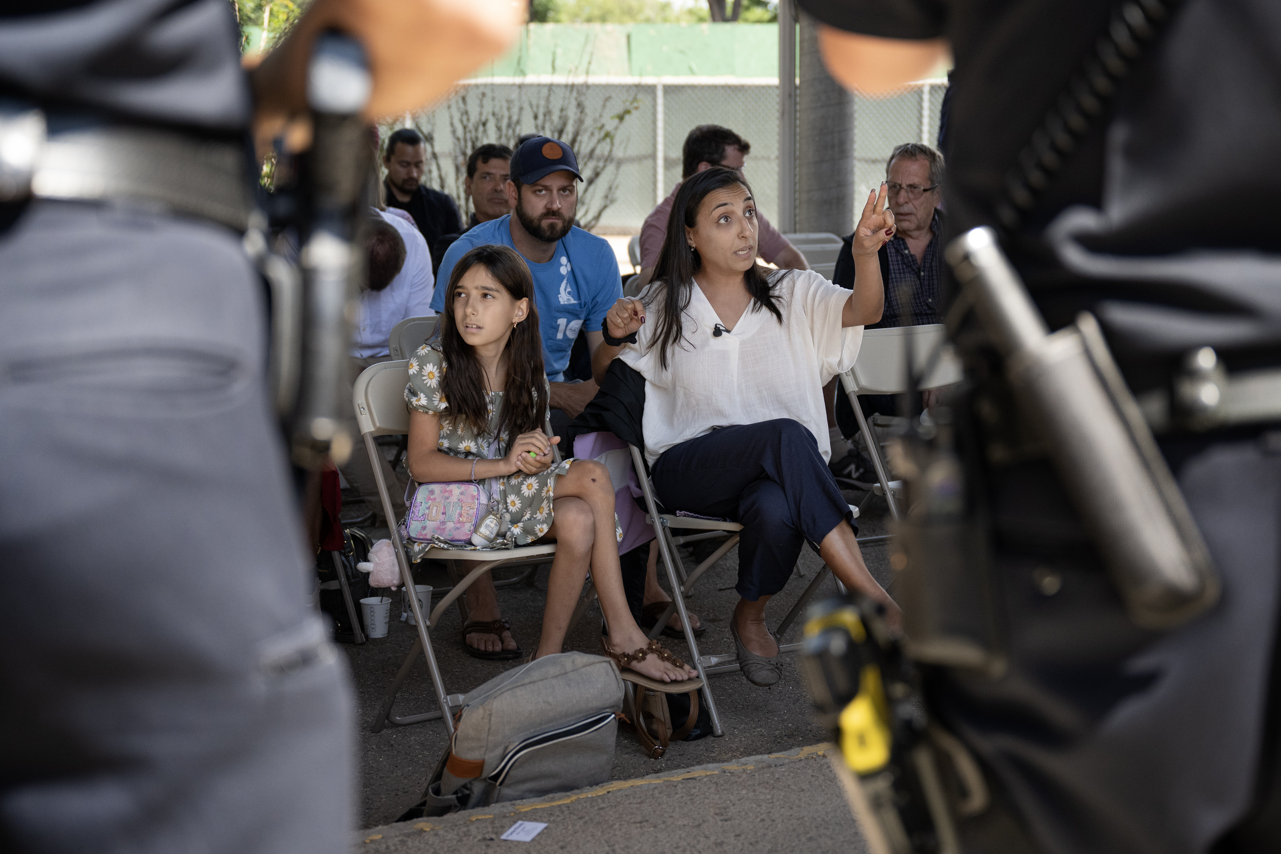 Janna Steele sits next to her daughter Evie, 10, an incoming sixth grader to Morey Middle School, while asking Denver Police Department officials questions about traffic safety issues around the school during a Commander Advisory Group Meeting at the Denver Police Department District 6 station on Thursday, July 20, 2023, in Denver, Colo. (Timothy Hurst/Denver Gazette) (TimHursttim.hurst@gazette.comhttps://secure.gravatar.com/avatar/aca82bd62b4ee425c598527cd6faa1b1?d=mm&r=g)