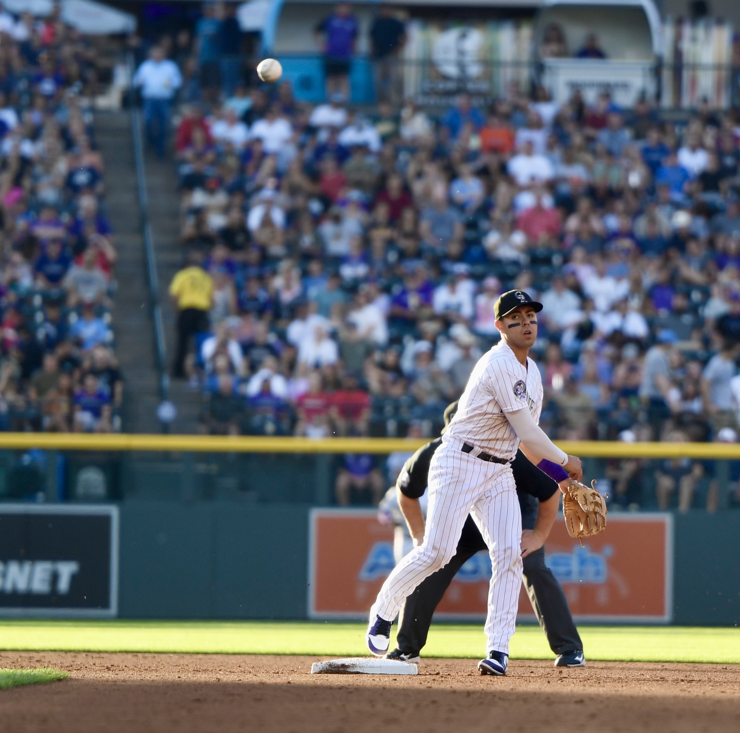 Rockies infielder Alan Trejo throws to first base against the Oakland Athletics on Friday, July 28, 2023. (CarsonFieldcarson.field@gazette.comhttps://secure.gravatar.com/avatar/c524ef3d384945349bed78d70eb2d2cd?d=mm&r=g)