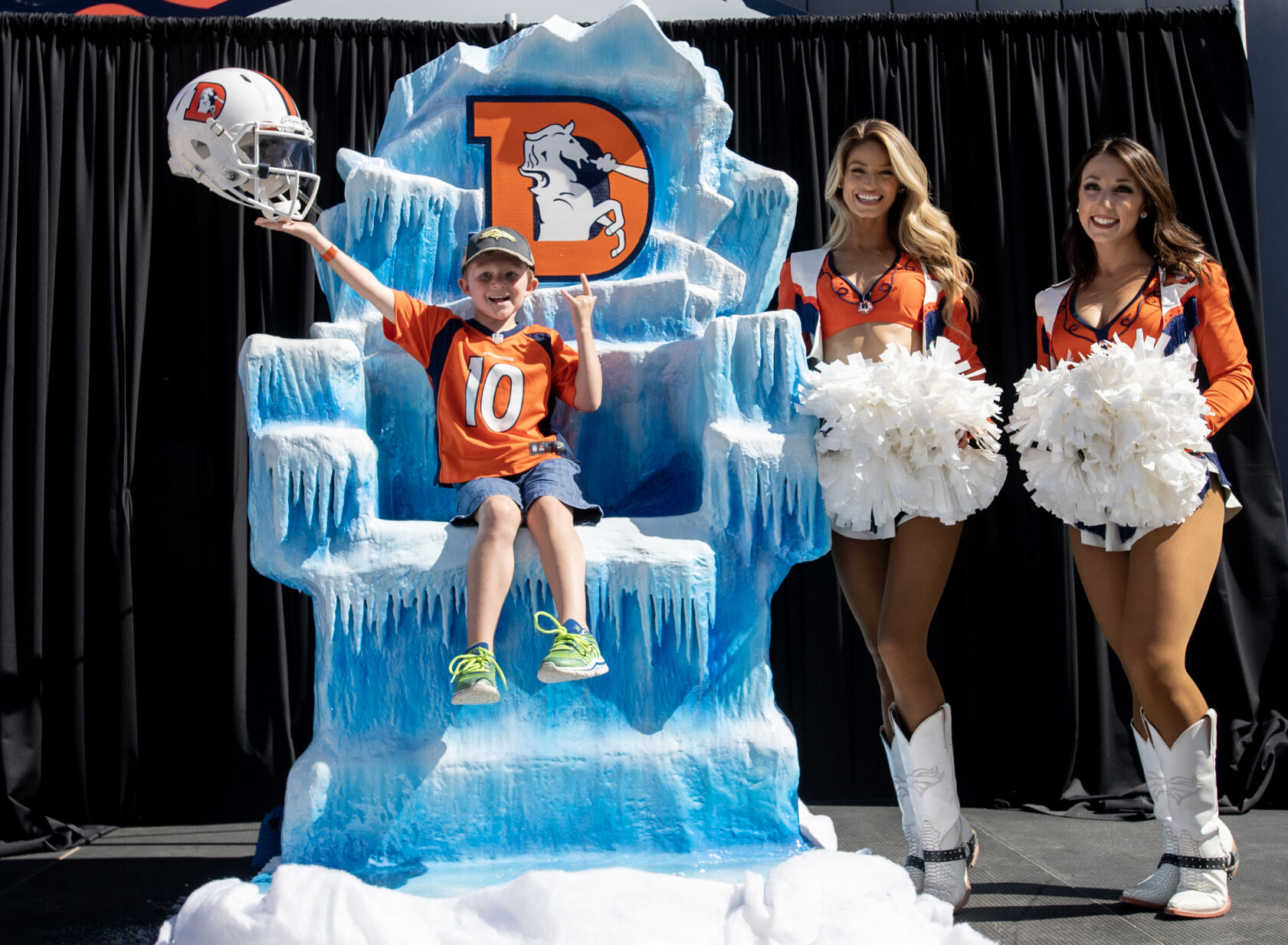 PHOTOS: Broncos fans admire team’s new helmet and meet players at training camp