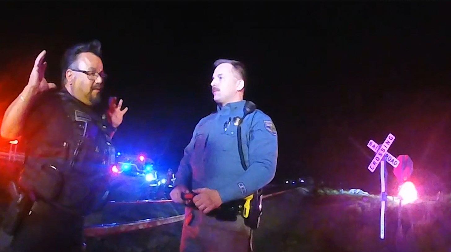 Former Platteville Police Office Pablo Vazquez faces two misdemeanor charges for leaving his cruiser on train tracks with a detainee inside.