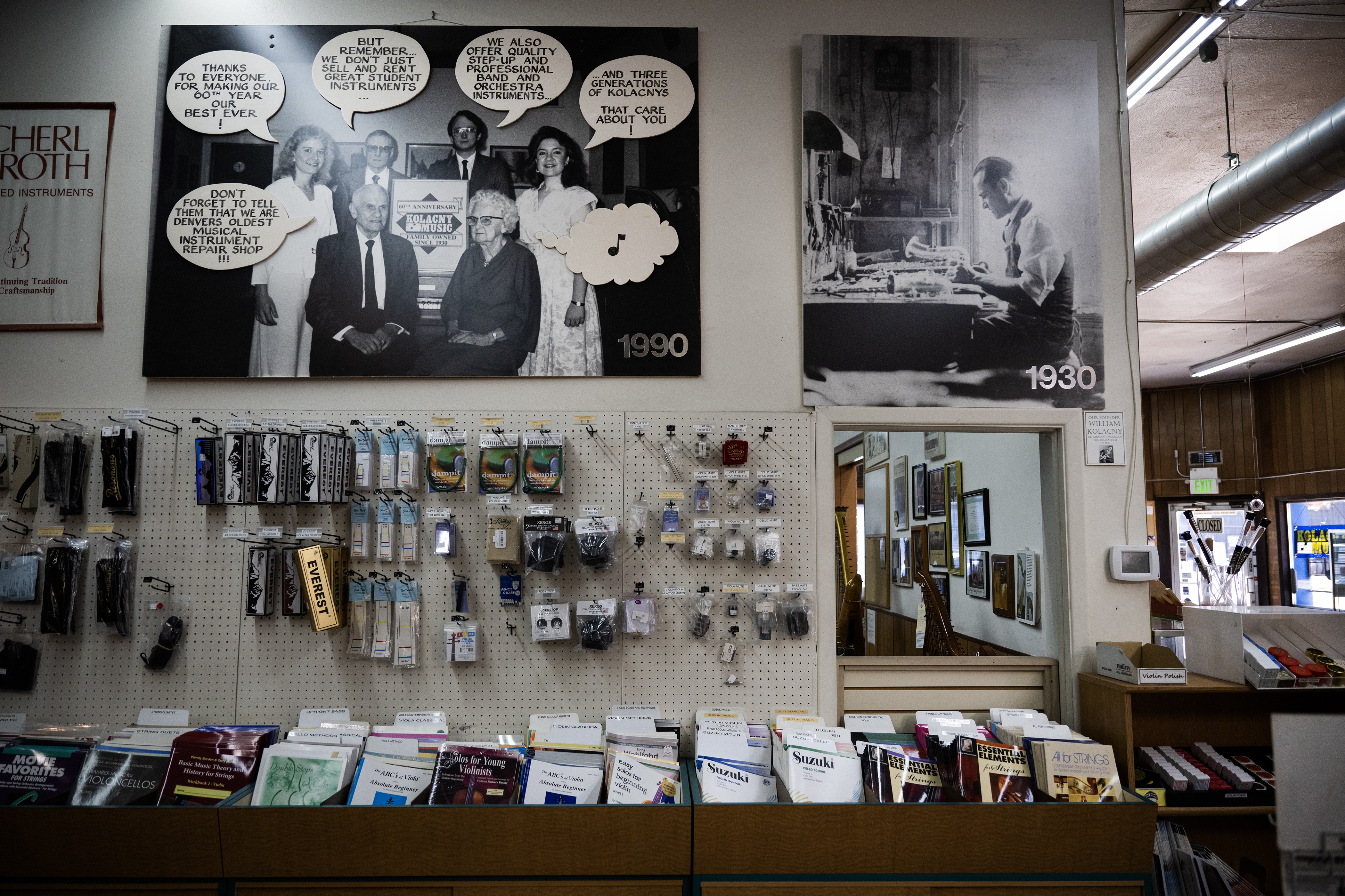 Large photographs of the three generations of Kolacnys, starting with the founder William Kolacny on the right, hang above racks of violin and viola accessories and sheet music on Monday, July 17, 2023, at Kolacny Music Co. in Denver, Colo. (Timothy Hurst/Denver Gazette) (TimHursttim.hurst@gazette.comhttps://secure.gravatar.com/avatar/aca82bd62b4ee425c598527cd6faa1b1?d=mm&r=g)