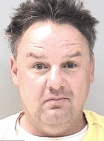 Kenneth Fairchild, 47, was arrested Saturday on suspicion of shooting a rifle Saturday at the Jus' Burritos restaurant in Broomfield, off Highway 287. The suspect's car looks extremely similar to one videotaped where a man shot at The Beauvallon condominium complex at 9th and Lincoln streets, Denver, July 4. Neither Broomfield, nor Denver, police have confirmed a link. (Broomfield Police Department)