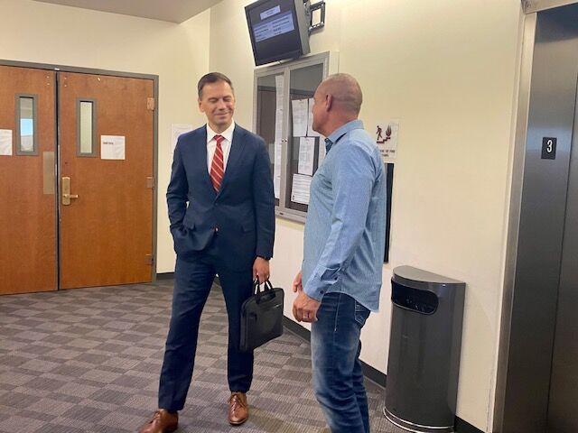Arapahoe County District Attorney John Kellner and Mark Pray wait for an elevator as they leave the courtroom for lunch break. Pray is the brother of victim Angela Pray Craig. (CarolMcKinleyDenver Enterprise Reportercarol.mckinley@gazette.comhttps://denvergazette.com/content/tncms/avatars/5/c3/a0f/5c3a0fbe-1007-11ec-9e18-b7f42cfa4b0f.9565a0ce58866e86bcf18260621c2a46.png)