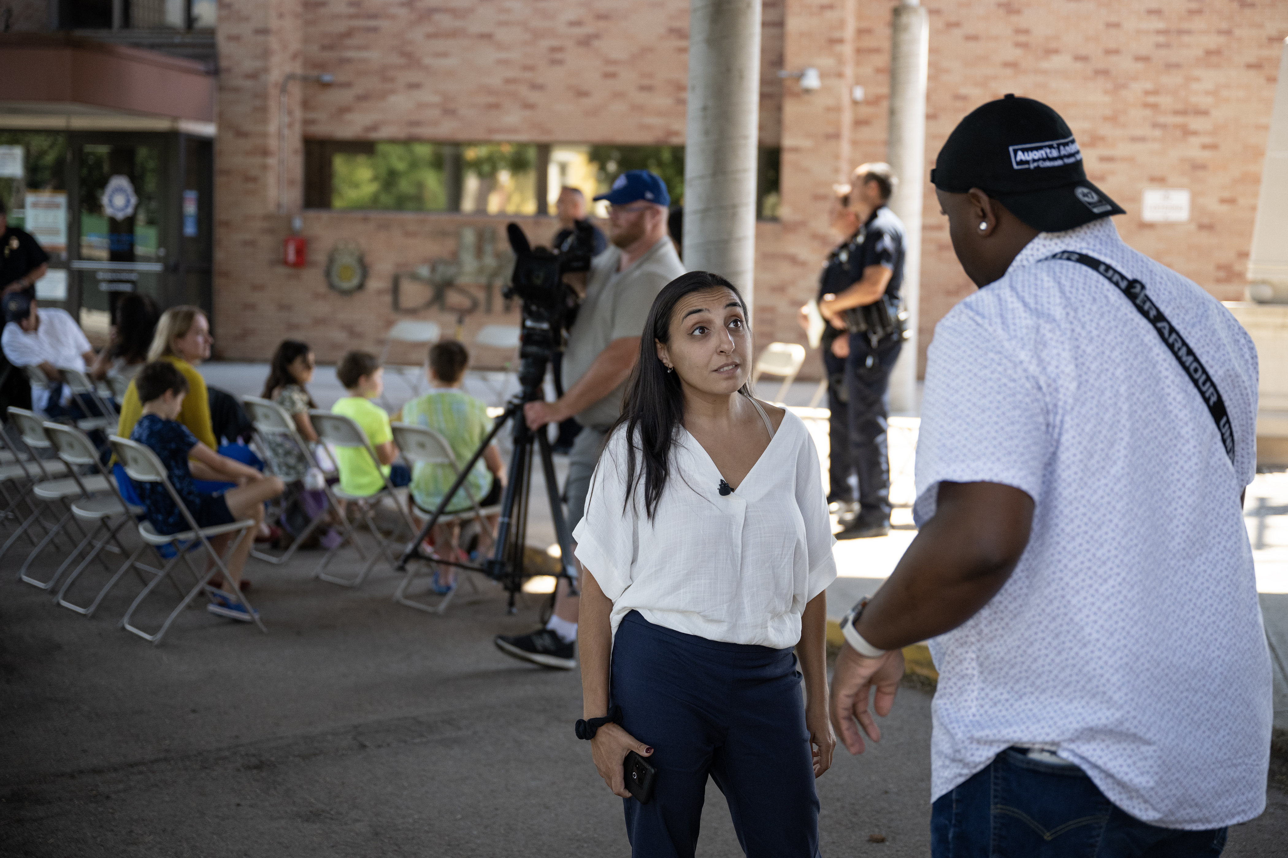 Janna Steele, the parent of an incoming sixth grader to Morey Middle School, speaks to Denver Public Schools Board of Education vice president Auon'tai Anderson about traffic safety issues around the school during a Commander Advisory Group Meeting at the Denver Police Department District 6 station on Thursday, July 20, 2023, in Denver, Colo. (Timothy Hurst/Denver Gazette) (TimHursttim.hurst@gazette.comhttps://secure.gravatar.com/avatar/aca82bd62b4ee425c598527cd6faa1b1?d=mm&r=g)