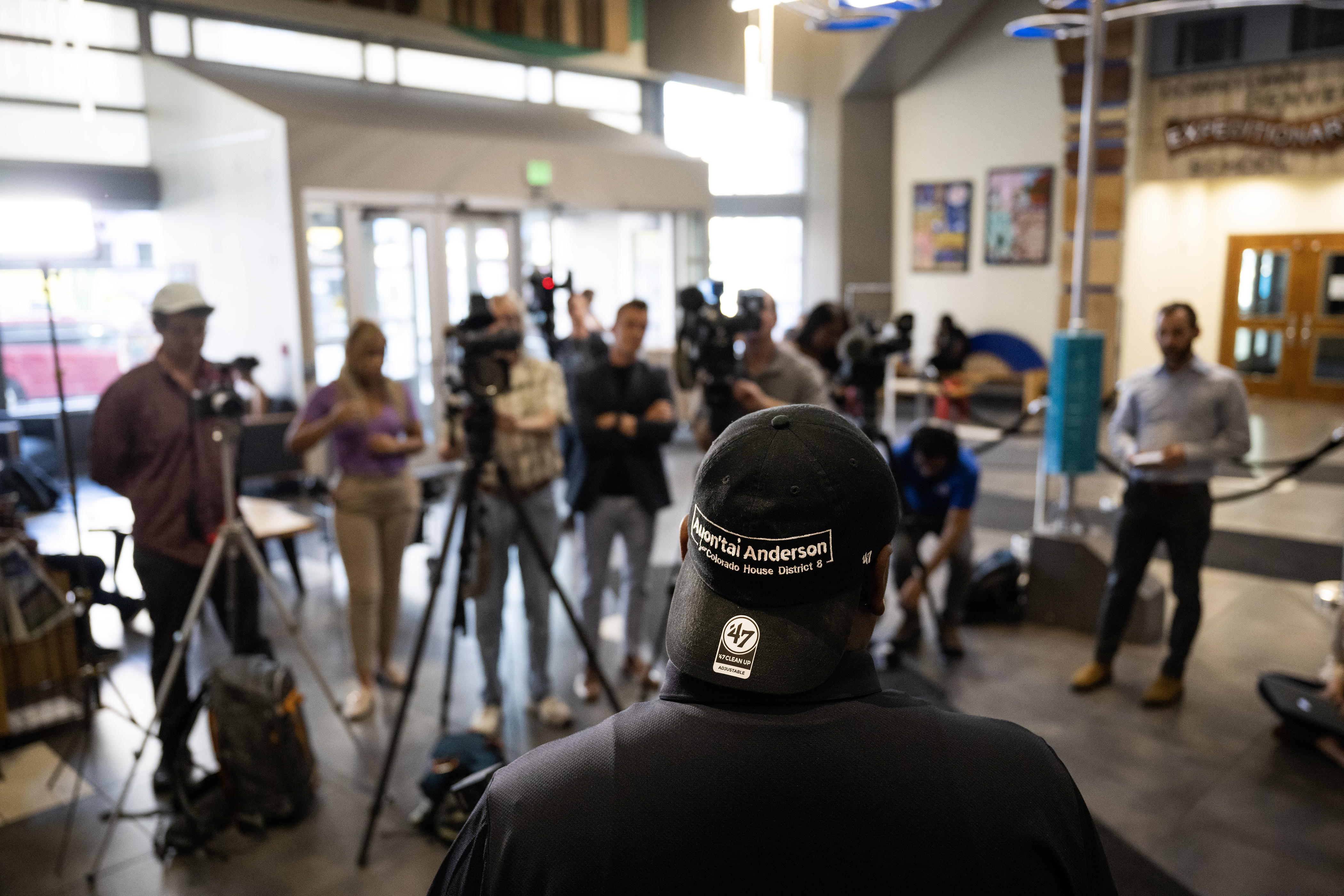 Denver Public Schools Board of Education vice president Auon'tai Anderson wears a hat with his Colorado House of Representatives election campaign slogan while conducting a press conference following a Board of Education Special Board Meeting to discuss and vote on the release of a recording of a closed-door meeting the day after the March 22 shooting at East High School, on Friday, July 21, 2023, in Denver, Colo. (Timothy Hurst/Denver Gazette) (TimHursttim.hurst@gazette.comhttps://secure.gravatar.com/avatar/aca82bd62b4ee425c598527cd6faa1b1?d=mm&r=g)