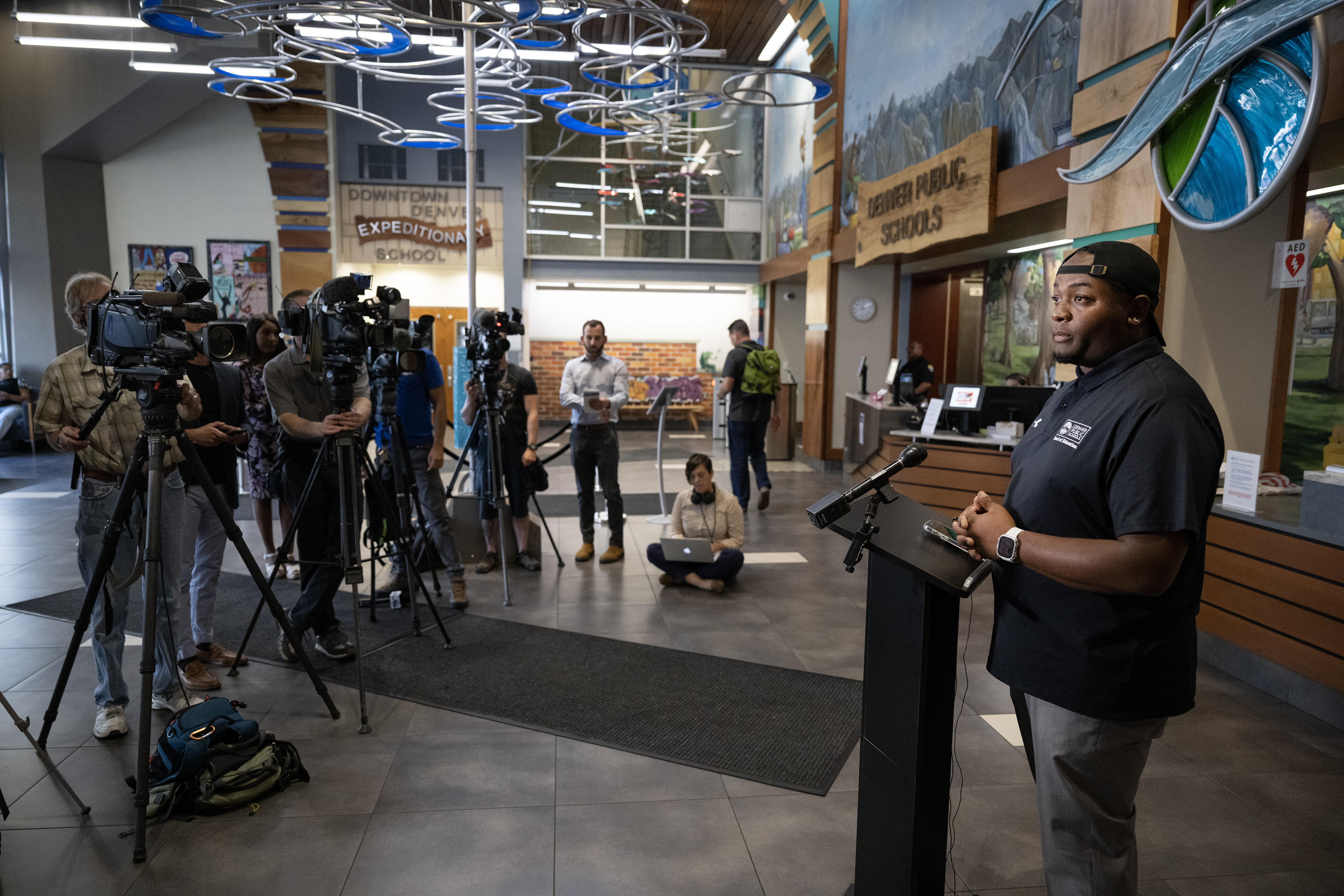 Denver Public Schools Board of Education vice president Auon'tai Anderson, right, conducts a press conference following a Board of Education Special Board Meeting to discuss and vote on the release of a recording of a closed-door meeting the day after the March 22 shooting at East High School, on Friday, July 21, 2023, in Denver, Colo. (Timothy Hurst/Denver Gazette) (Timothy Hurst/Denver Gazette)