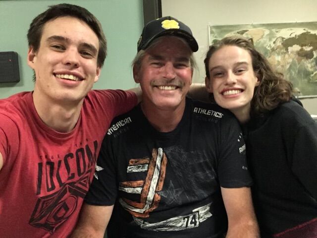 Brent Thompson (left) with his father, David, and his sister, Adrianne, in this undated photo. Thompson, 28, was killed by an oncoming SUV the night of Feb. 18, when a Larimer County sheriff's deputy tased him as he ran onto Interstate 25 after the deputy pulled him over because the car Thompson drove had expired plates. (Photo provided by Brent Thompson's family.)