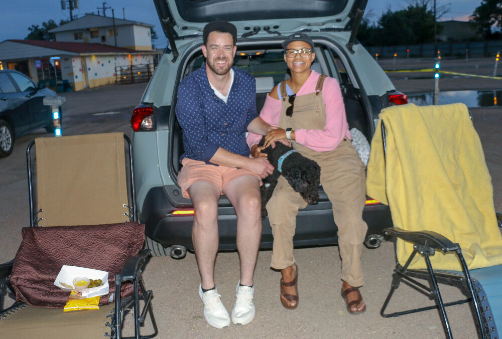 Jake Riederer, Cecilia Jones their goldendoodle Samuel L. Jackson, came to The 88 Drive-as a couple for in for the first time on Aug. 8, 2023. They own a 49 percent interest in Spinelli's Market. (John Moore, Denver Gazette)